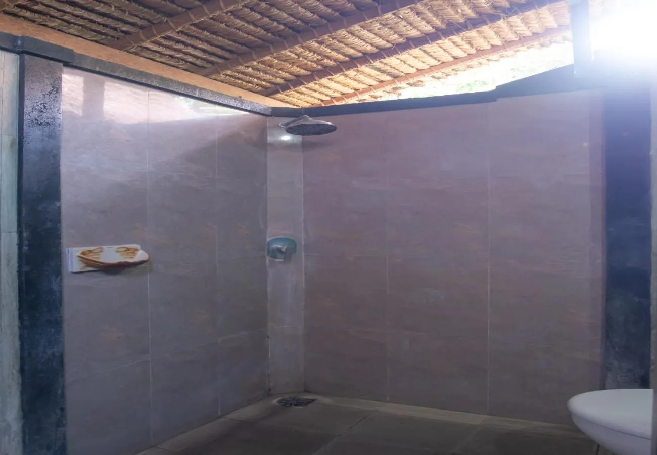 Shower in The Nichos Bungalows And Villas