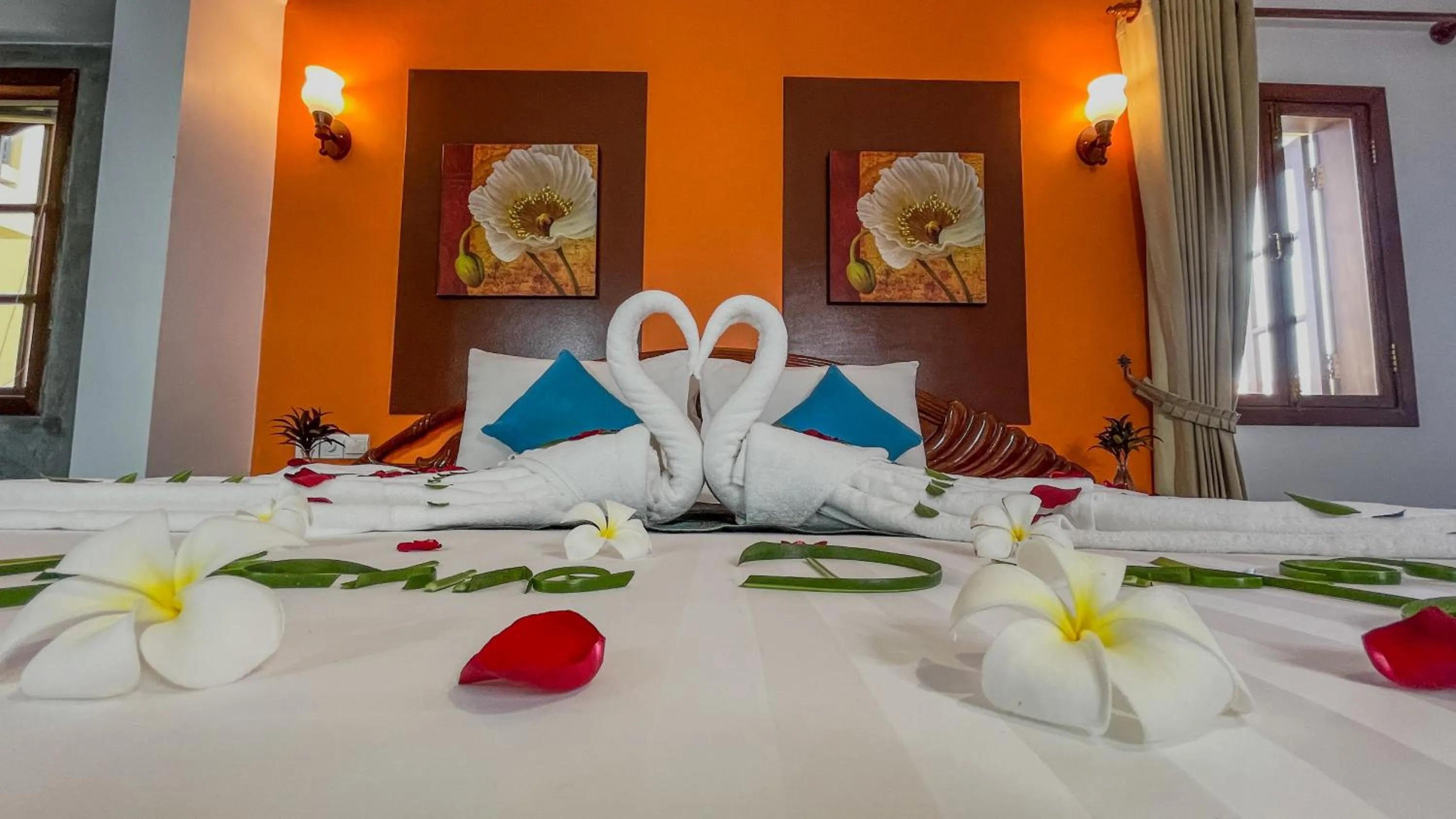 Bed in Villa Indochine d'Angkor