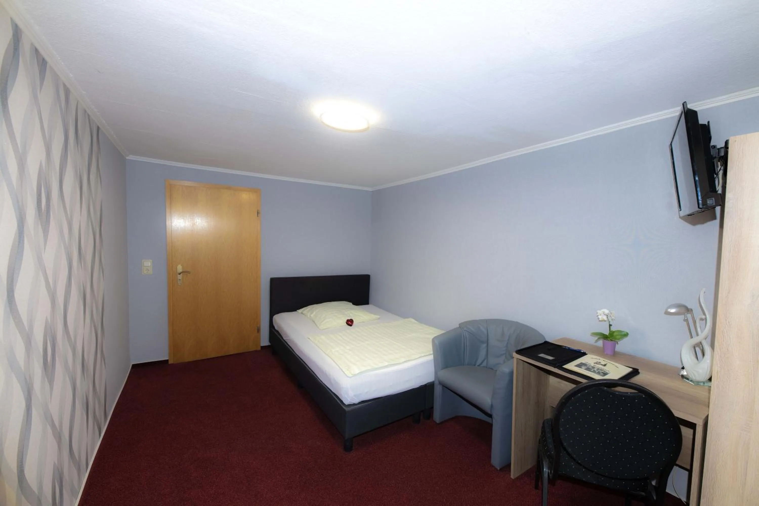 Bed in Hotel Am Rathaus