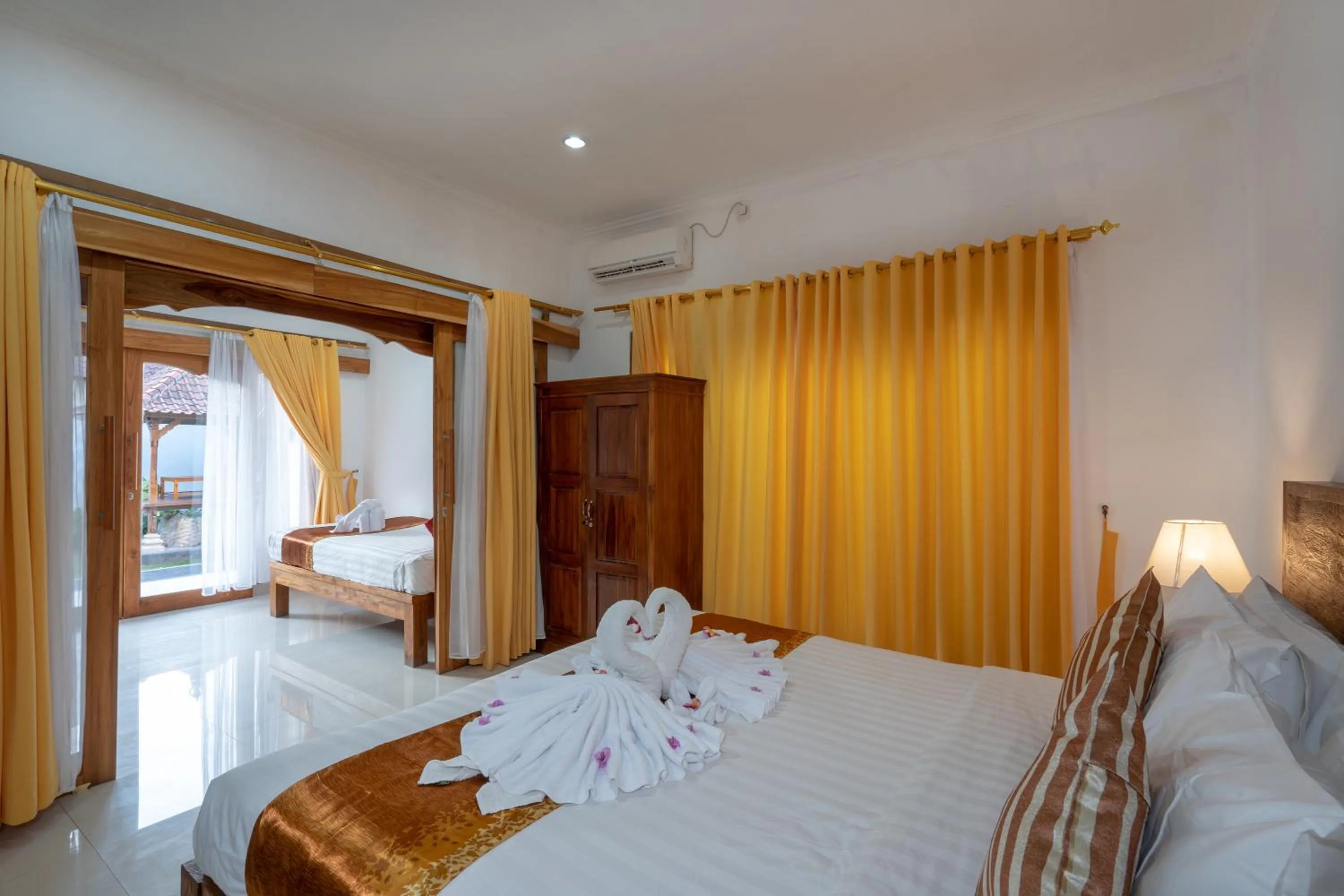 Photo of the whole room, Bed in Nusa Indah Bungalow