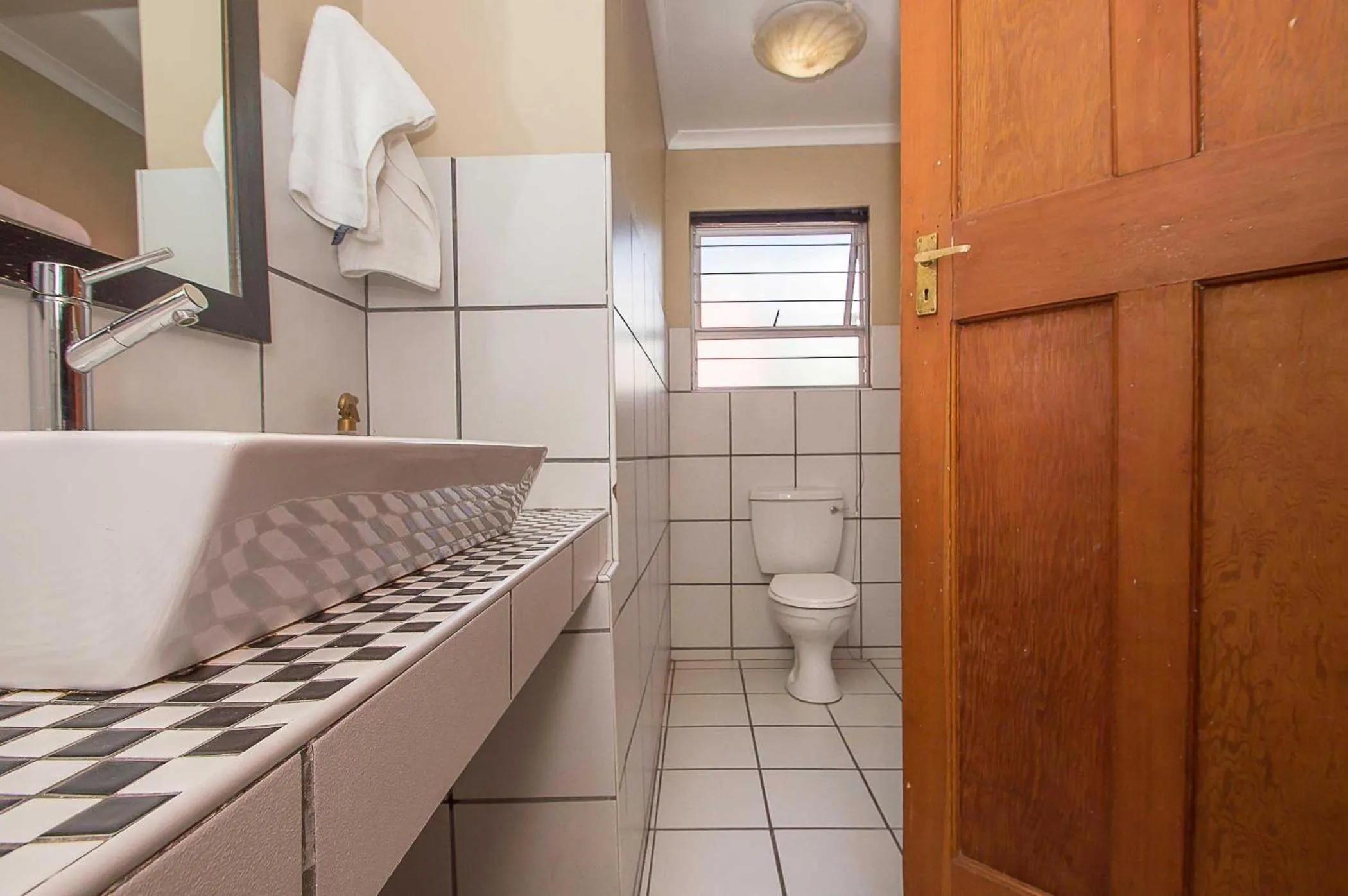 Toilet in Saffron Guest House