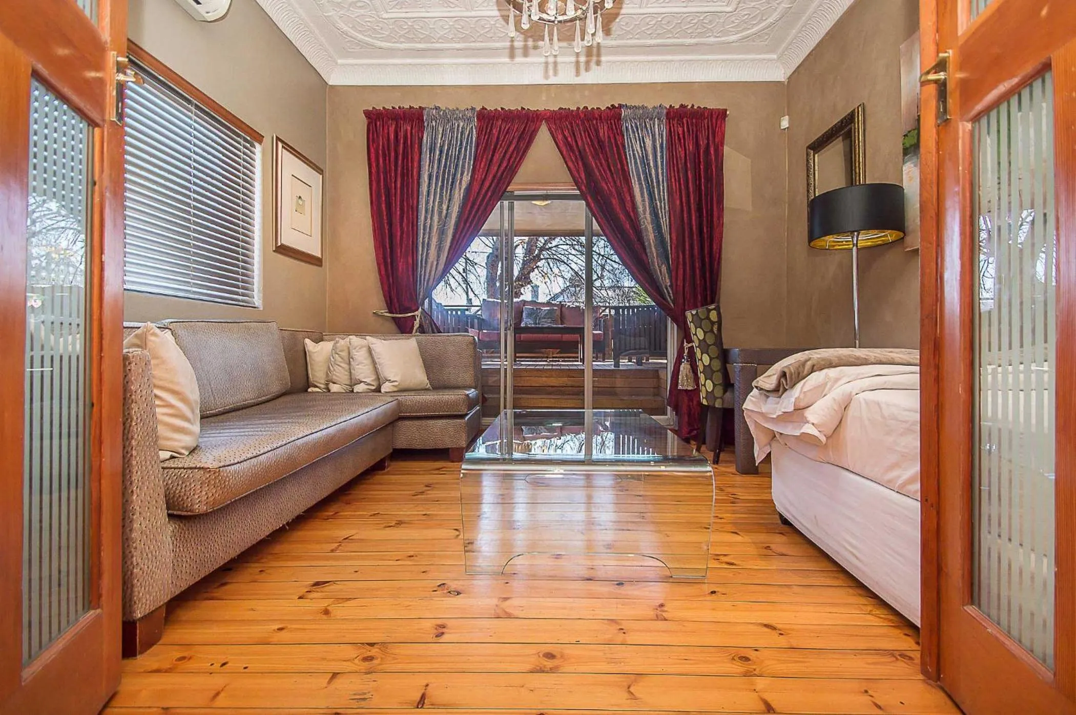Seating area, Bed in Saffron Guest House