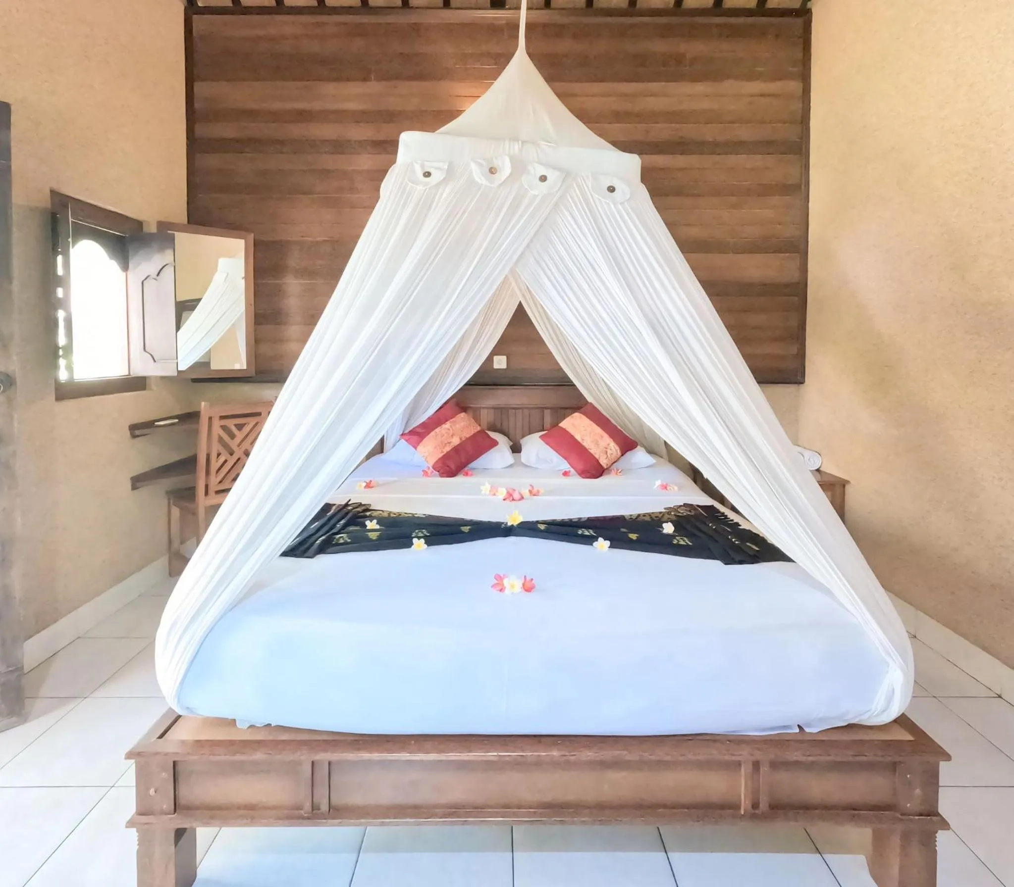Bed in Suka Sari Cottages