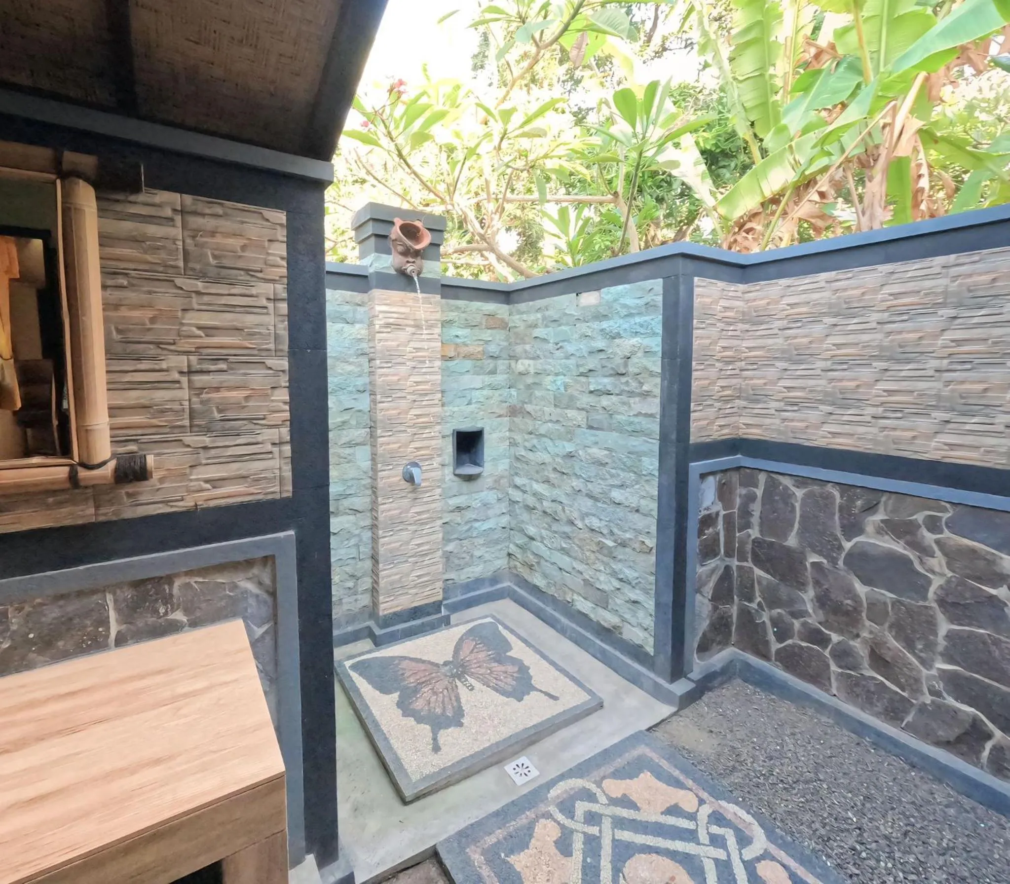 Shower in Suka Sari Cottages