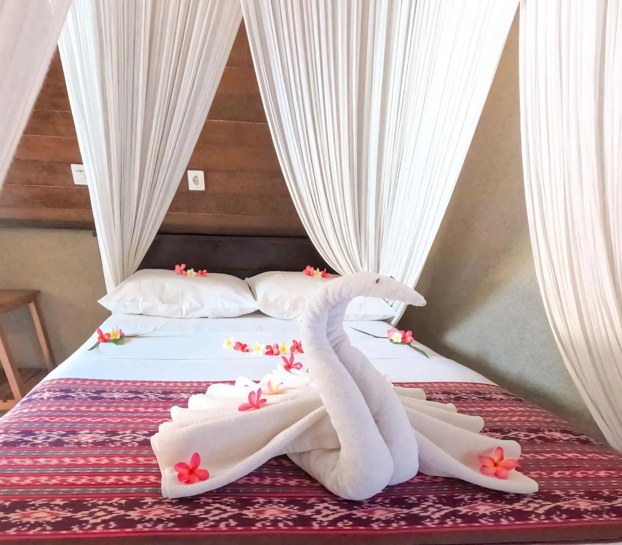 Bed in Suka Sari Cottages