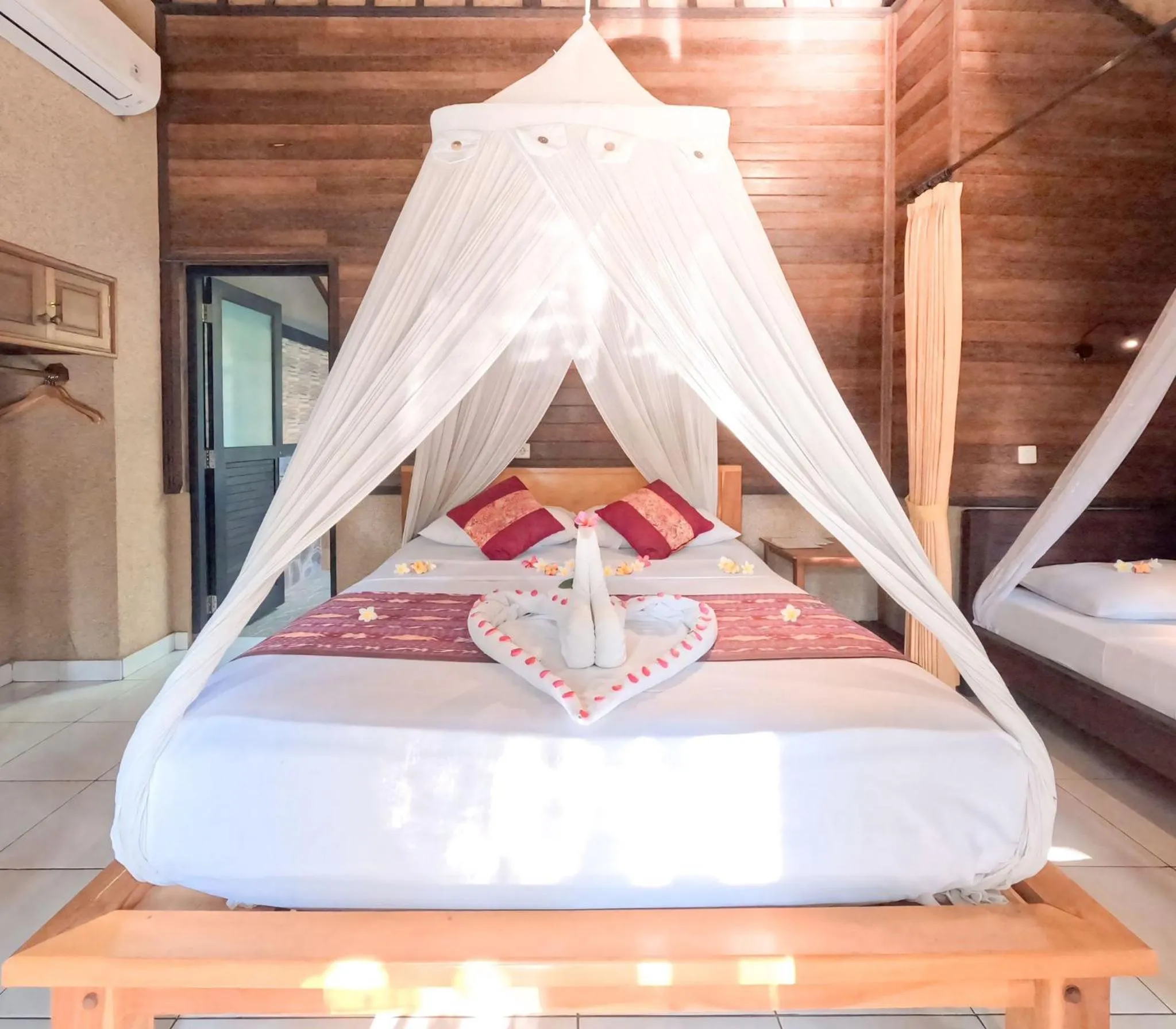 Bed in Suka Sari Cottages