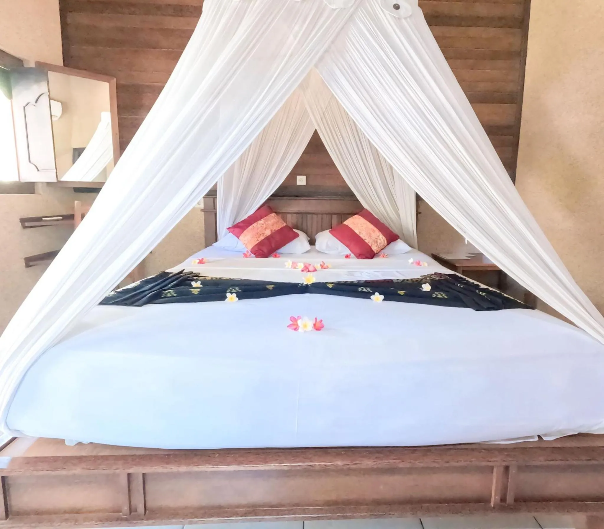 Bed in Suka Sari Cottages