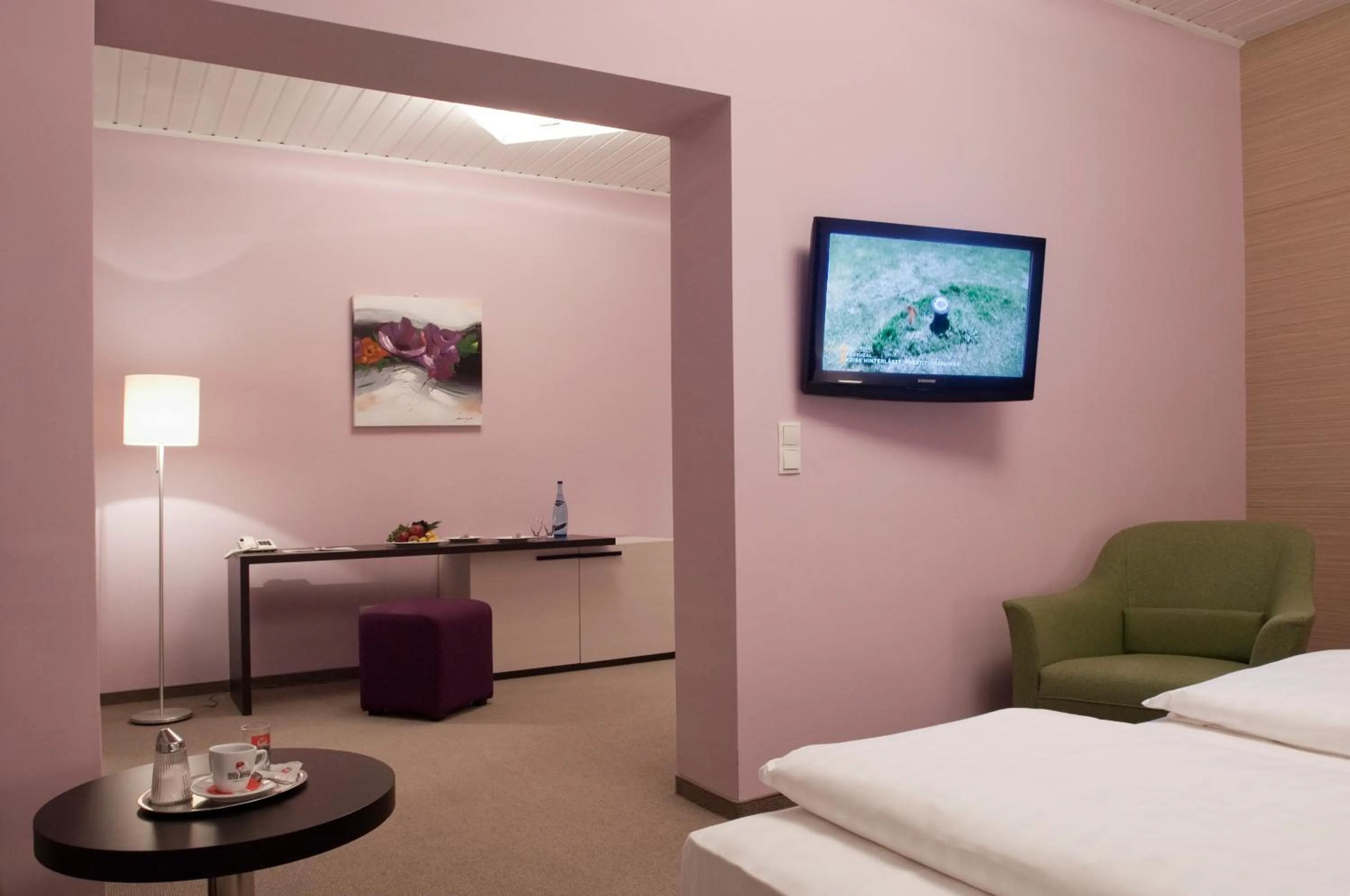 Bed in AKTIVHOTEL Weisser Hirsch