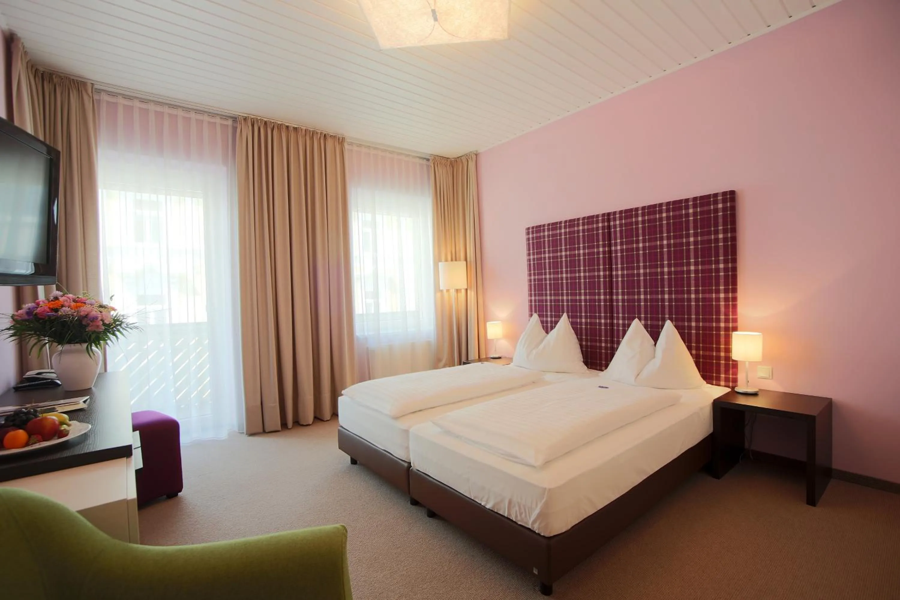 Bed in AKTIVHOTEL Weisser Hirsch