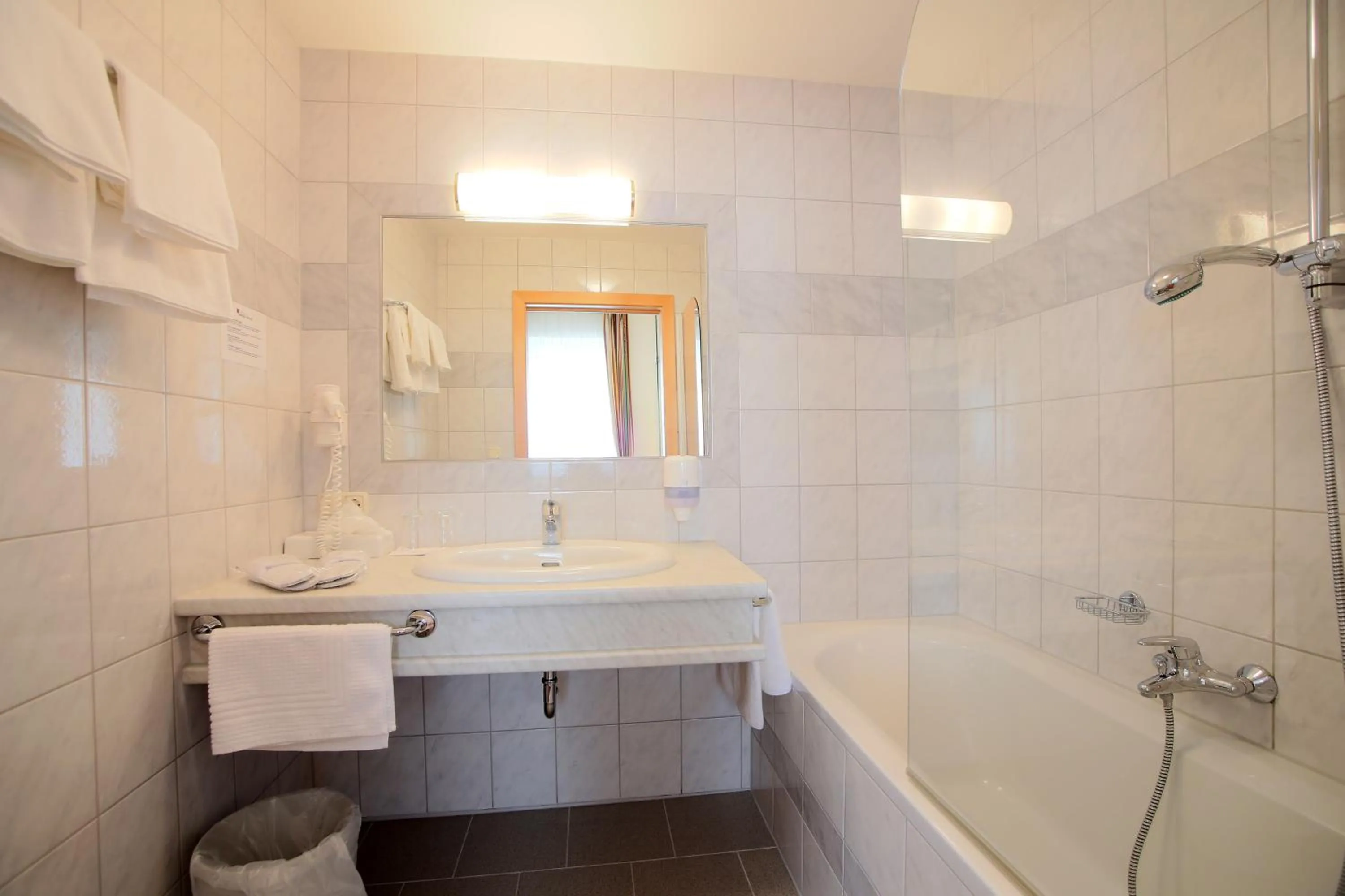 Bathroom in AKTIVHOTEL Weisser Hirsch