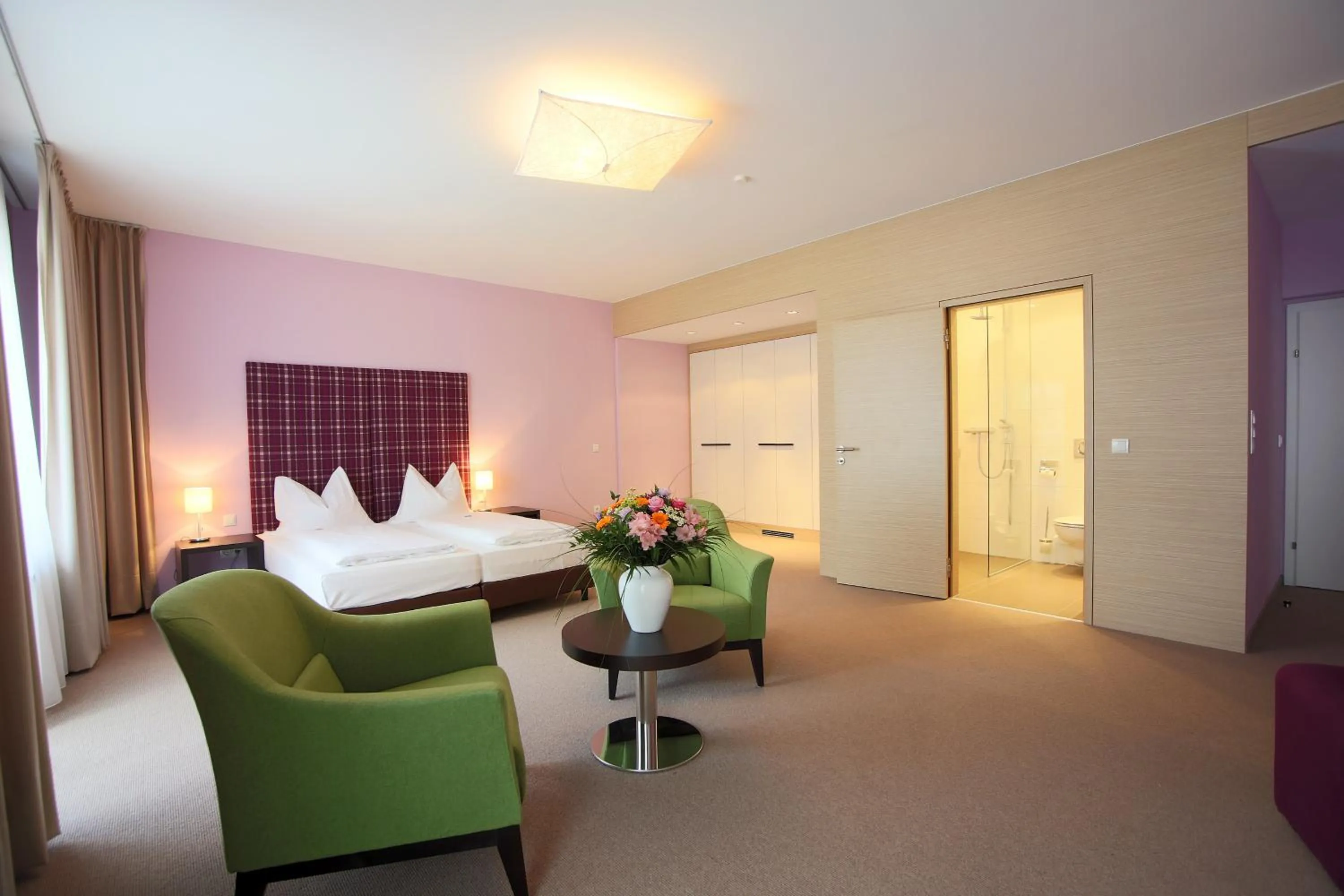 Bed in AKTIVHOTEL Weisser Hirsch