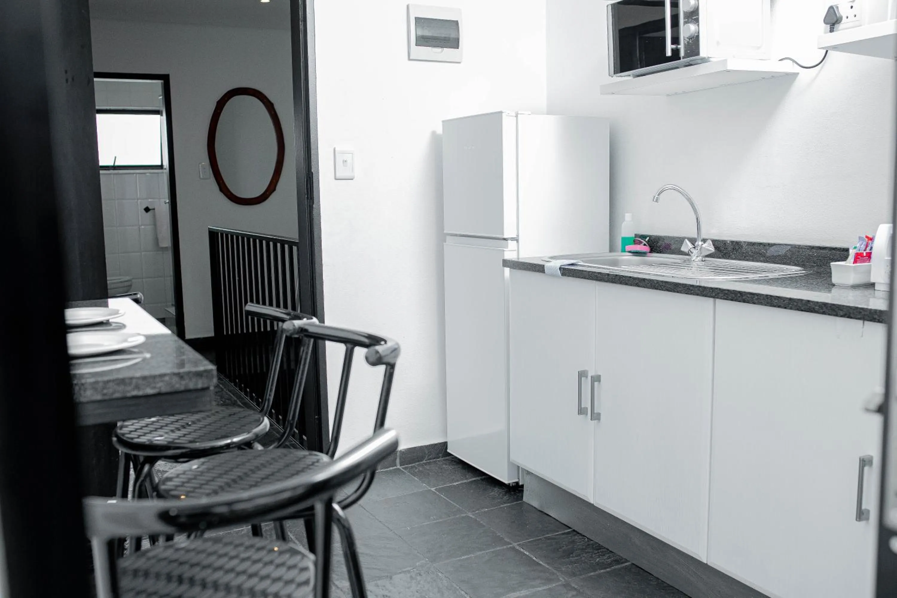 Kitchen or kitchenette in Vetho 1 Apartments OR Tambo Airport