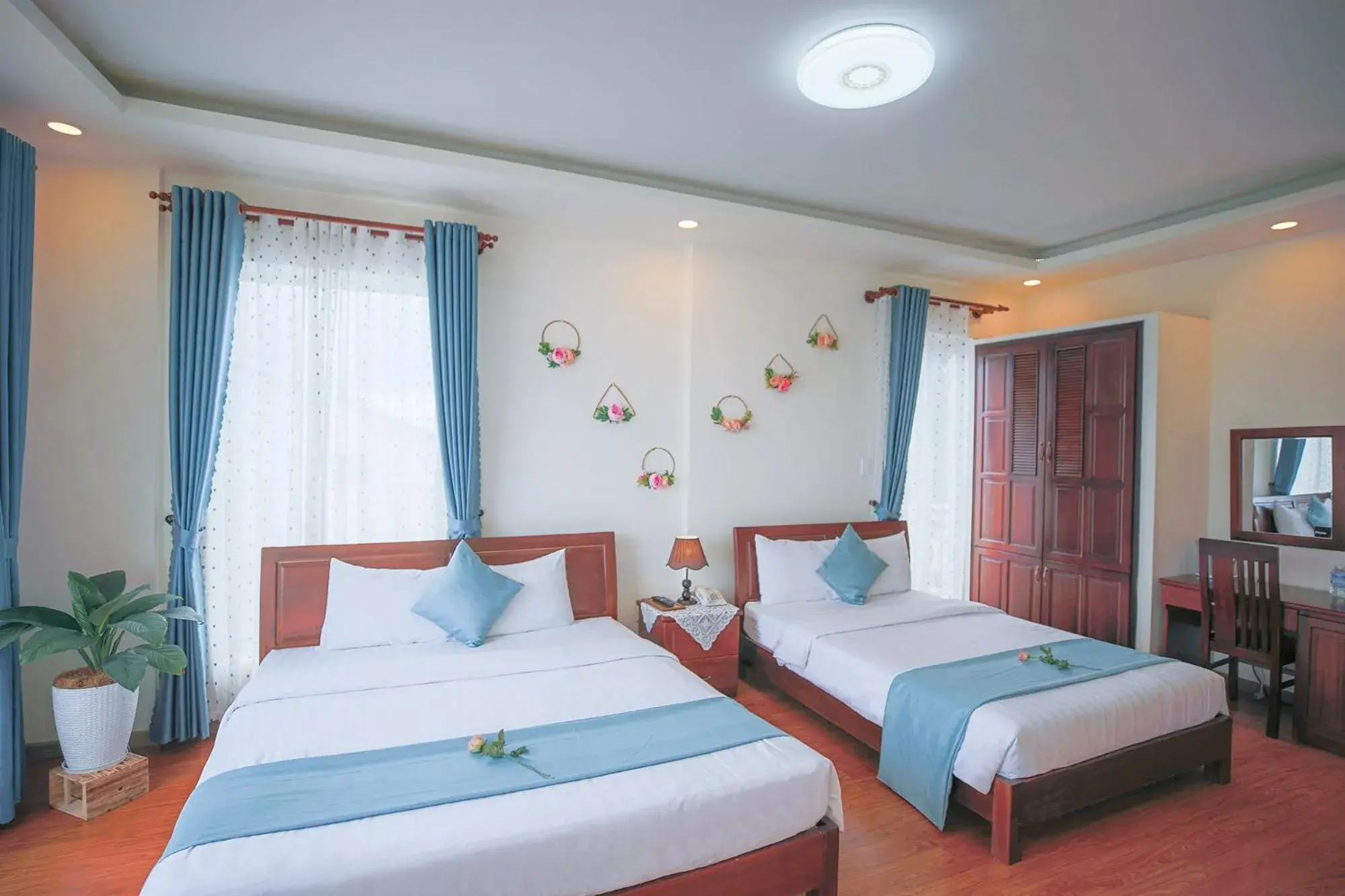 Deluxe Quadruple Room in Rose Valley Hotel Da Lat Vietnam Deluxe Quadruple Room in Rose Valley Hotel Da Lat Vietnam