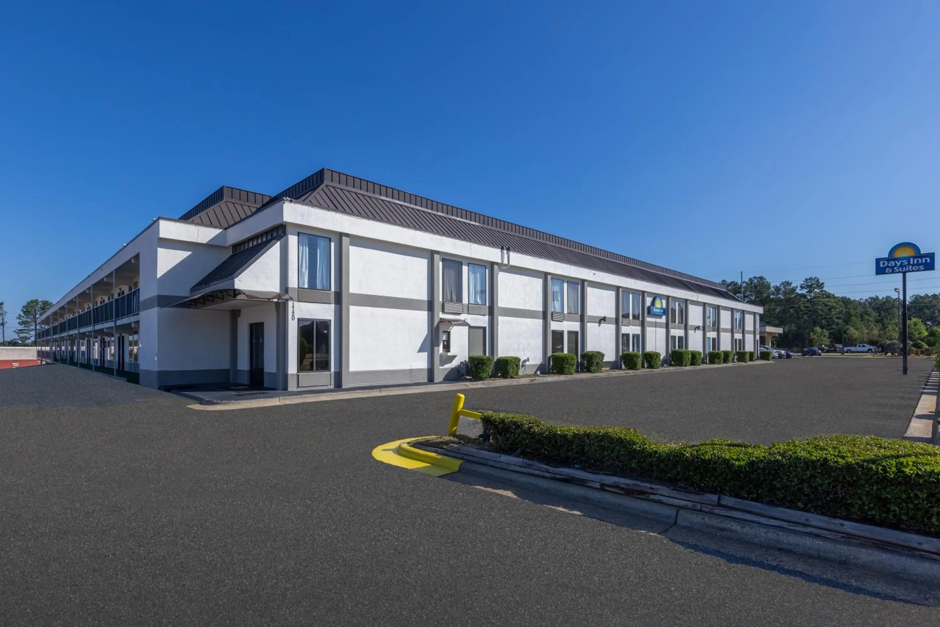 Property building in Days Inn & Suites by Wyndham Fort Bragg/Cross Creek Mall