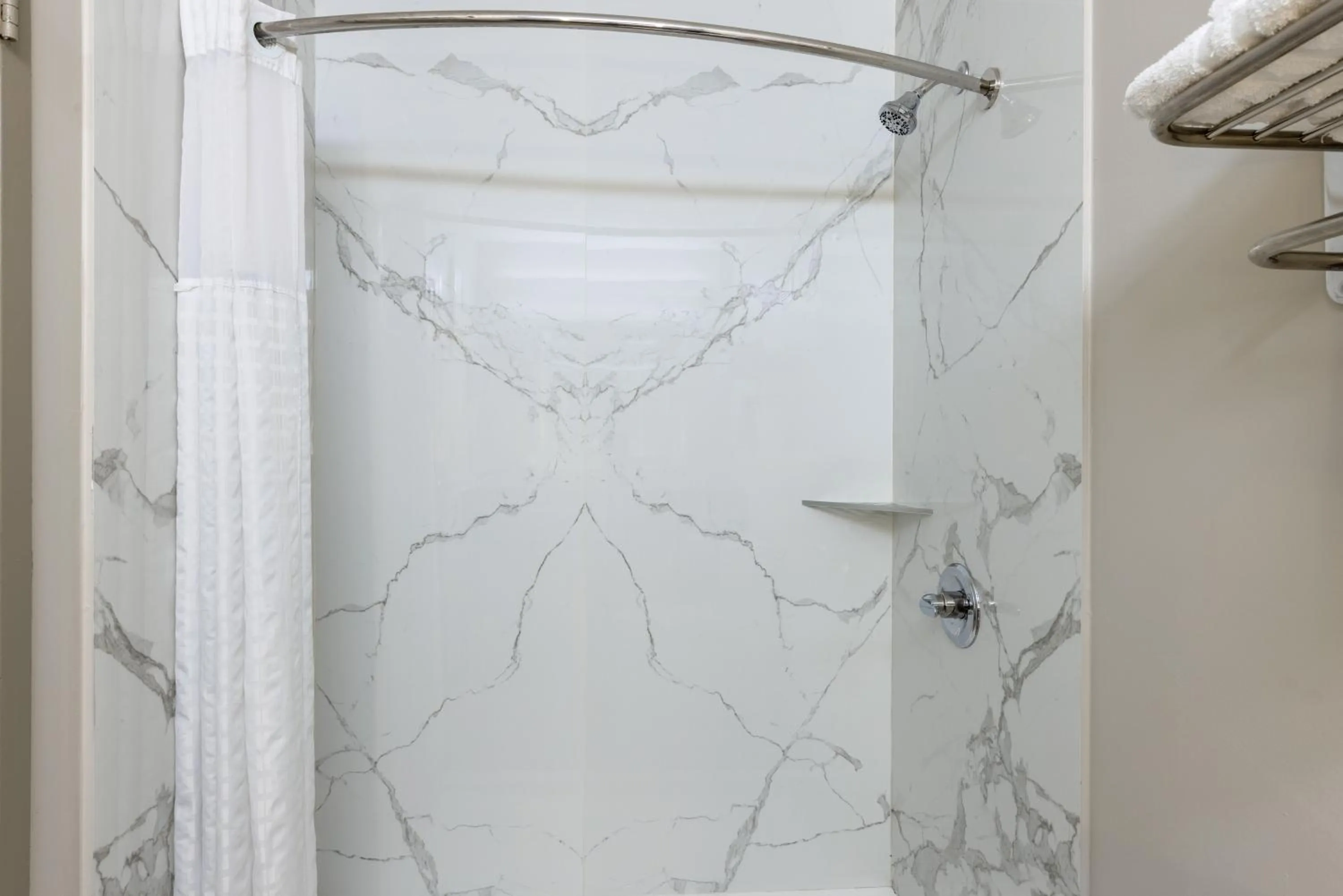 Bathroom in Days Inn & Suites by Wyndham Fort Bragg/Cross Creek Mall