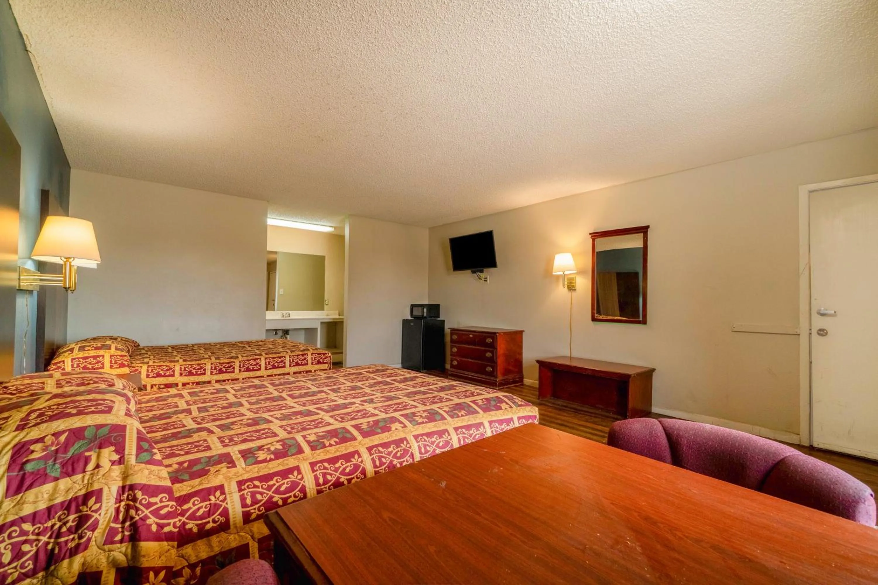 Bedroom, Bed in Executive Inn By OYO Mineral Wells US-180