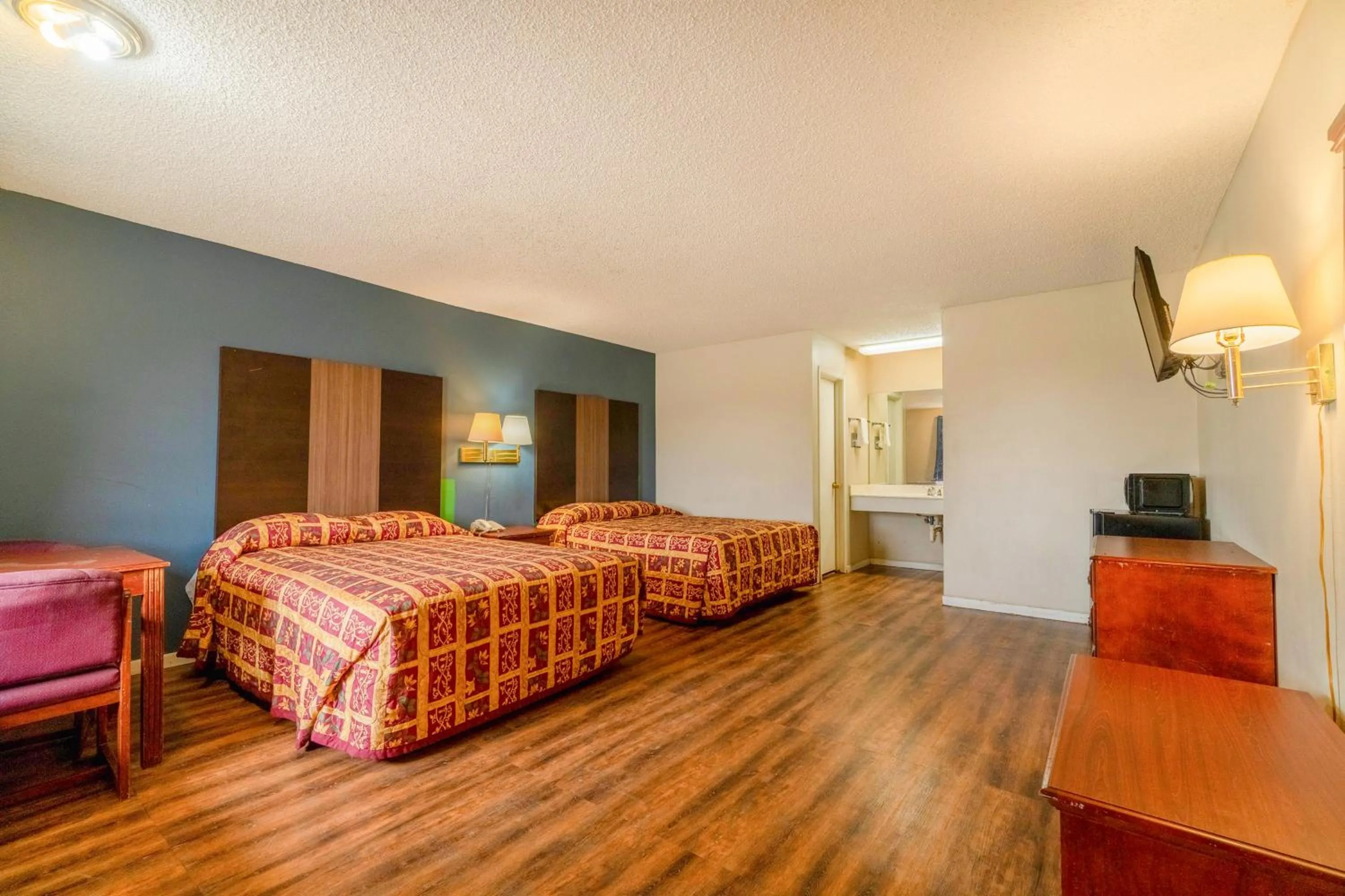 Bedroom, Bed in Executive Inn By OYO Mineral Wells US-180