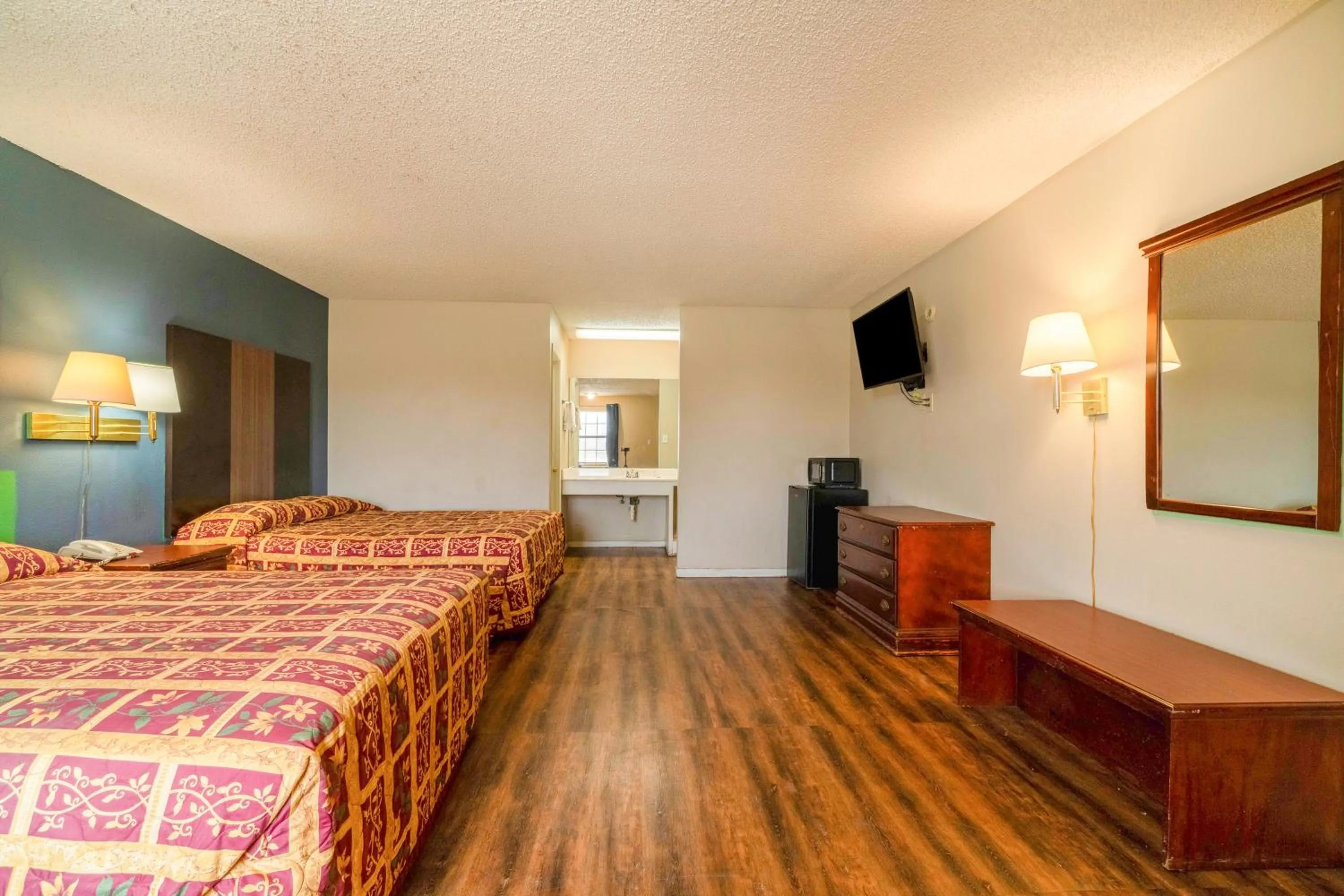 Bedroom, Bed in Executive Inn By OYO Mineral Wells US-180