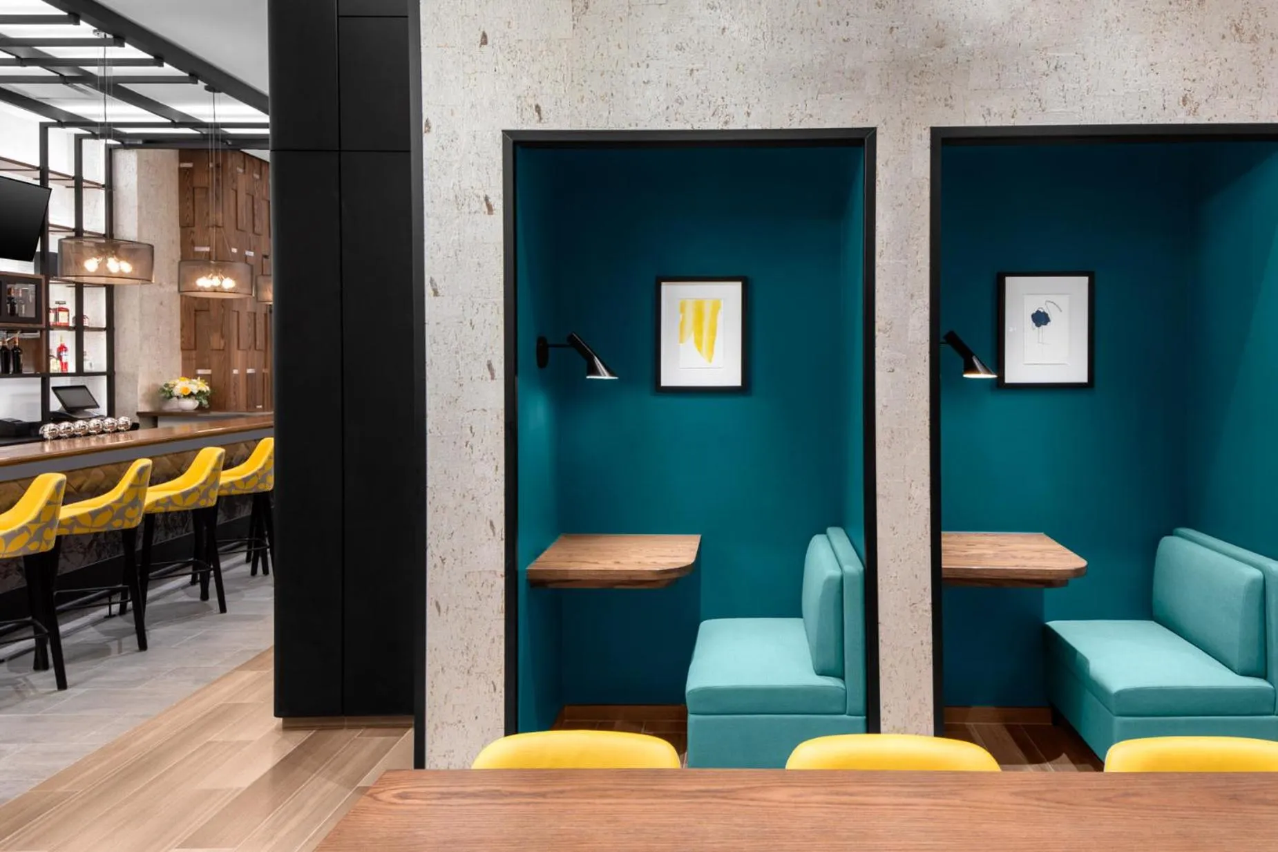 Lounge or bar in voco Times Square South New York by IHG