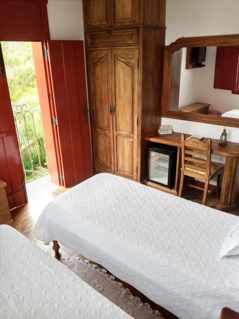 Bedroom, Bed in Pousada Araujo Bazilio