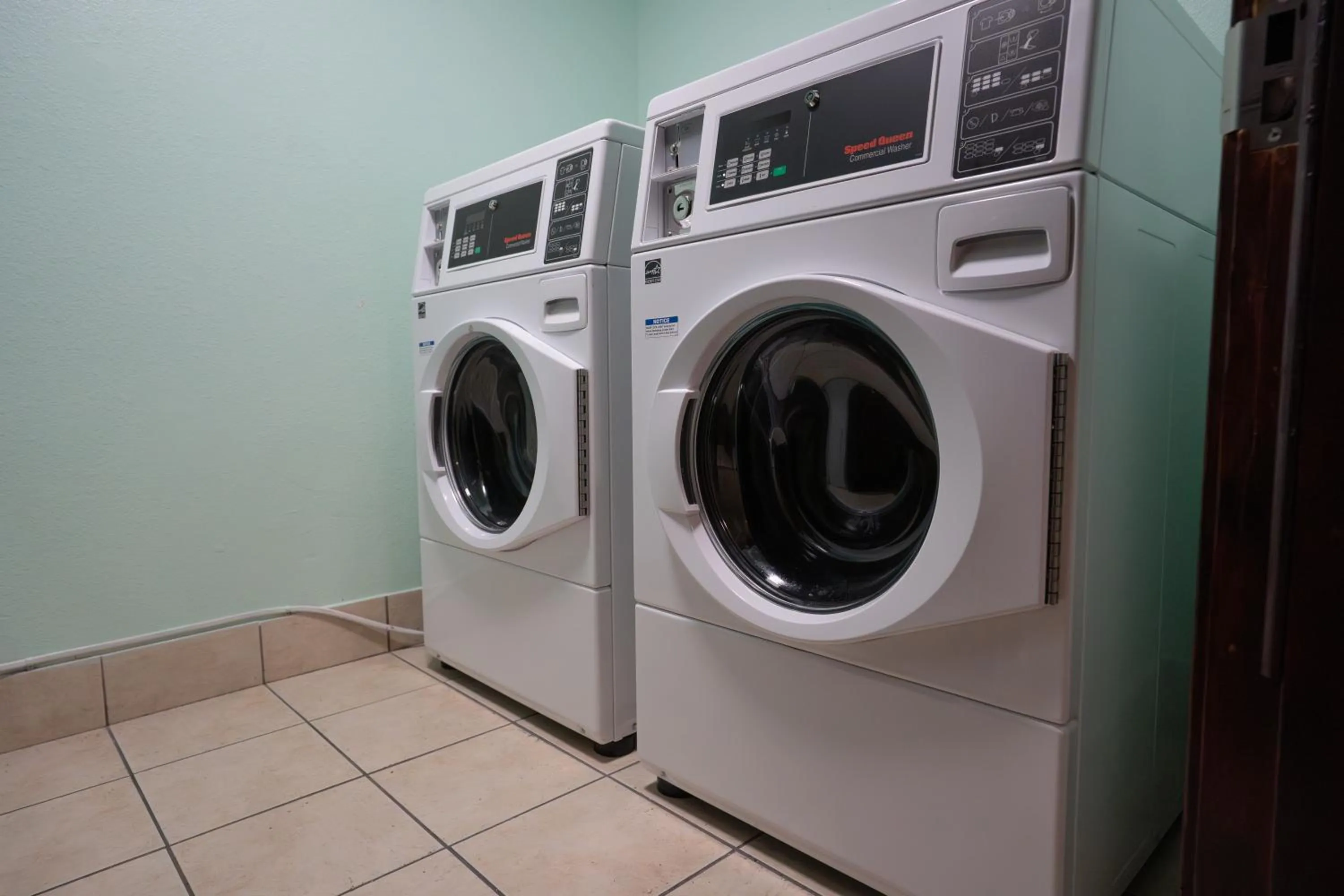 laundry in Ramada by Wyndham Tukwila Southcenter