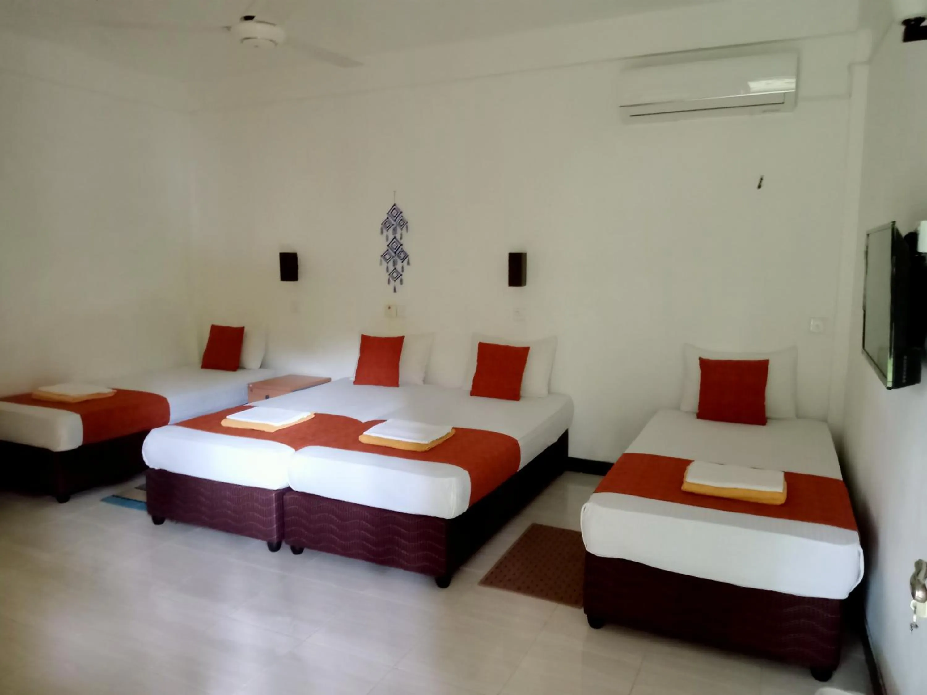 Bed in Kithmi Resort