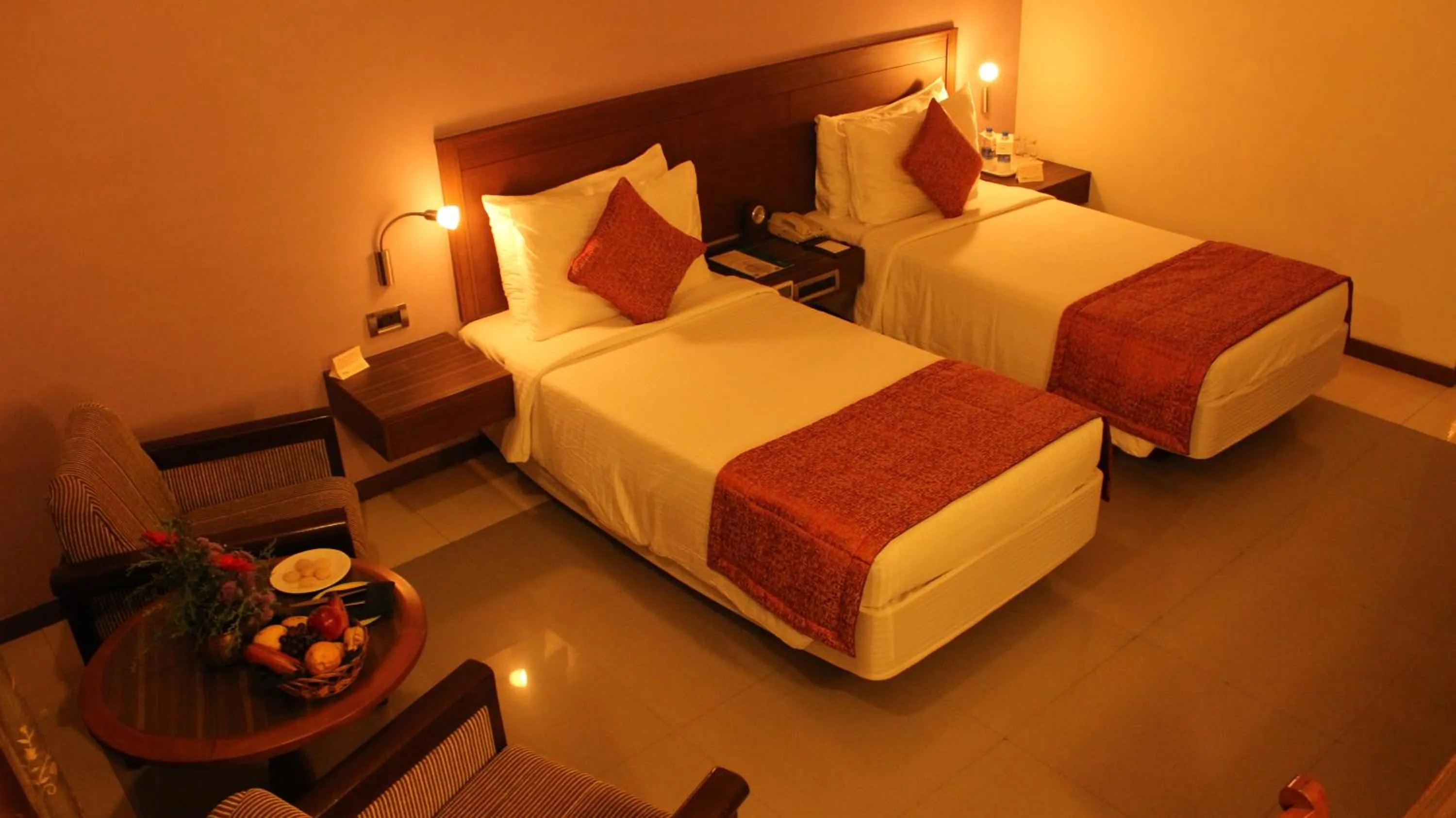 Photo of the whole room, Bed in Sangam Hotel, Thanjavur