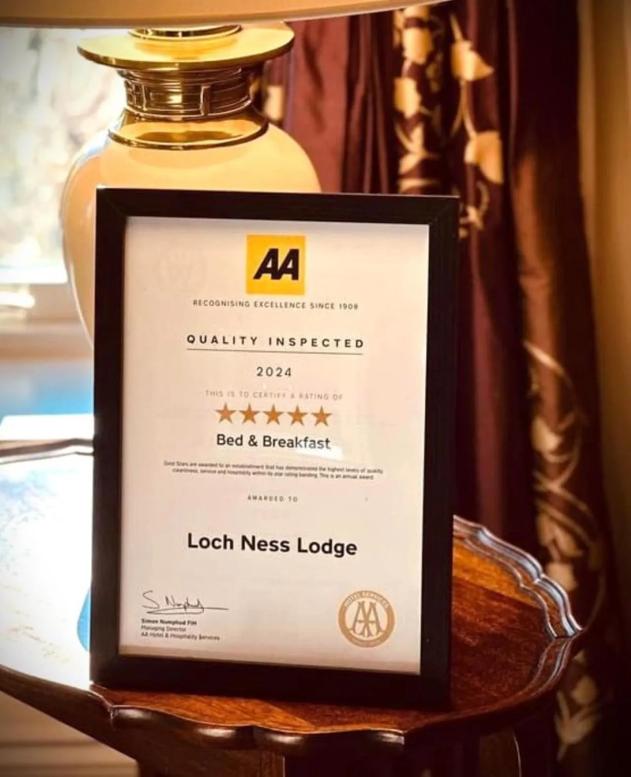 Logo/Certificate/Sign in Loch Ness Lodge