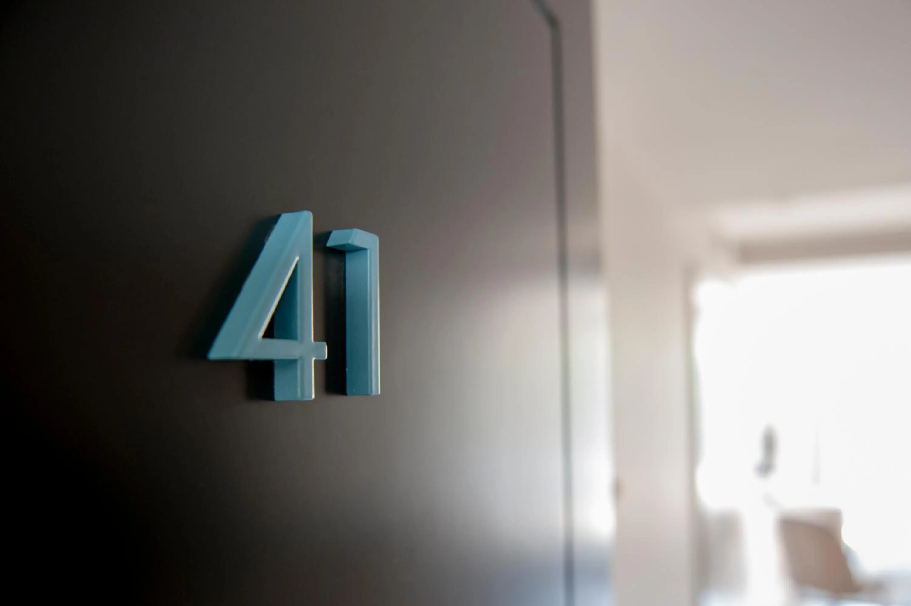 Logo/Certificate/Sign in MH Apartments Central Madrid