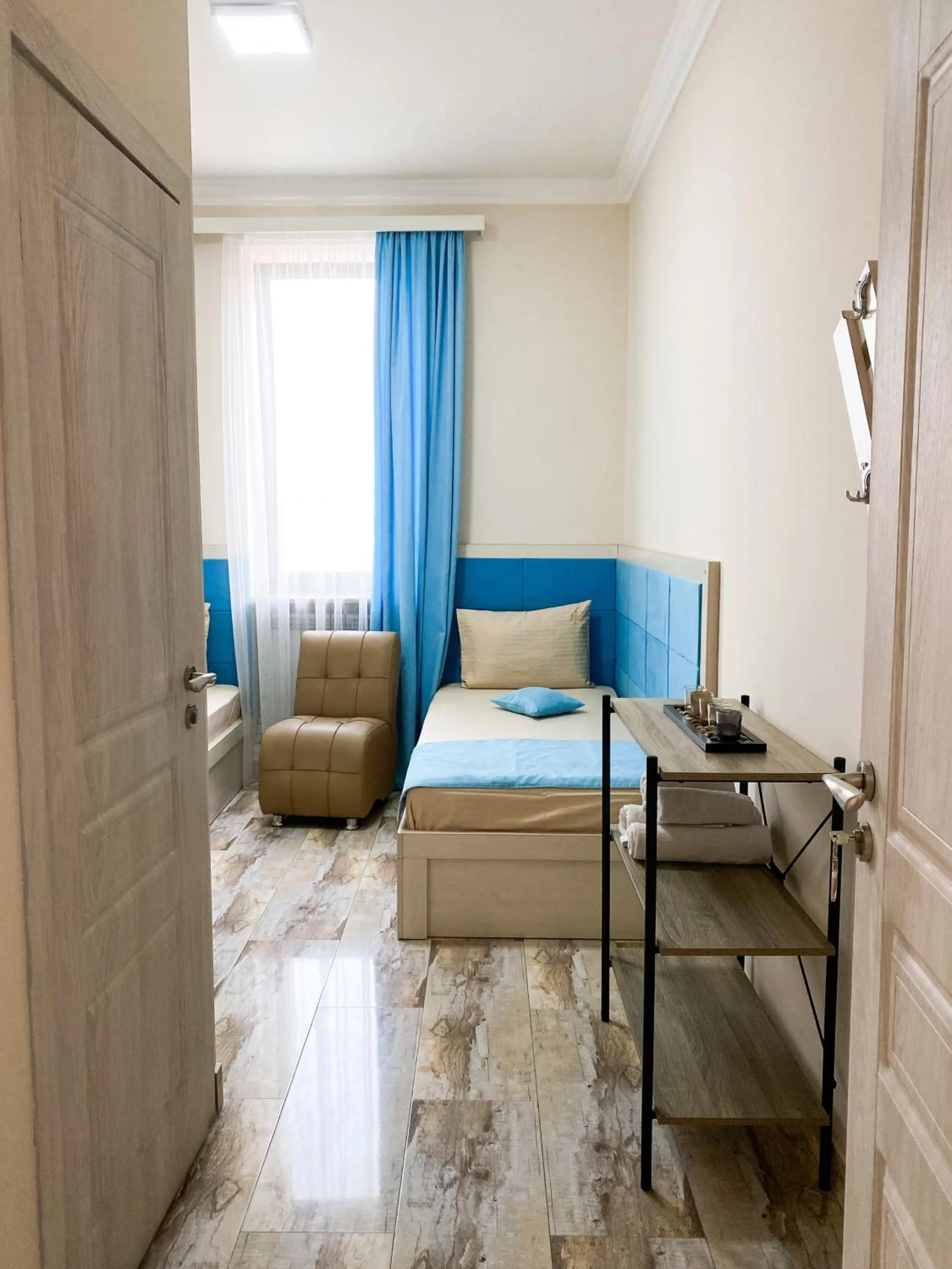 Living room, Bed in Alex Hotel