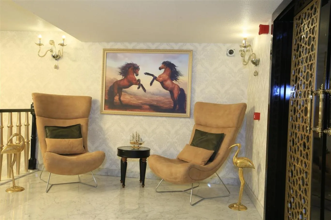 Seating area in SVEO Business Hotel