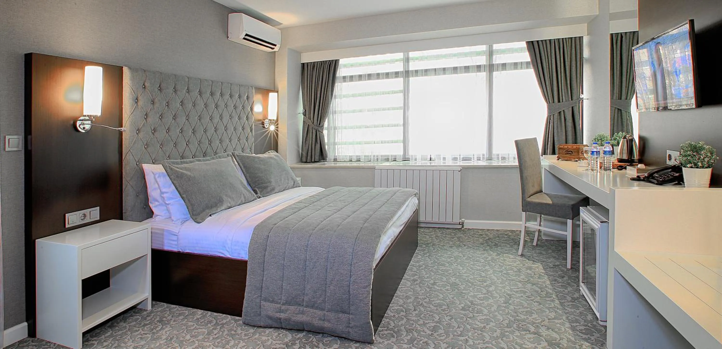 Bedroom in SVEO Business Hotel