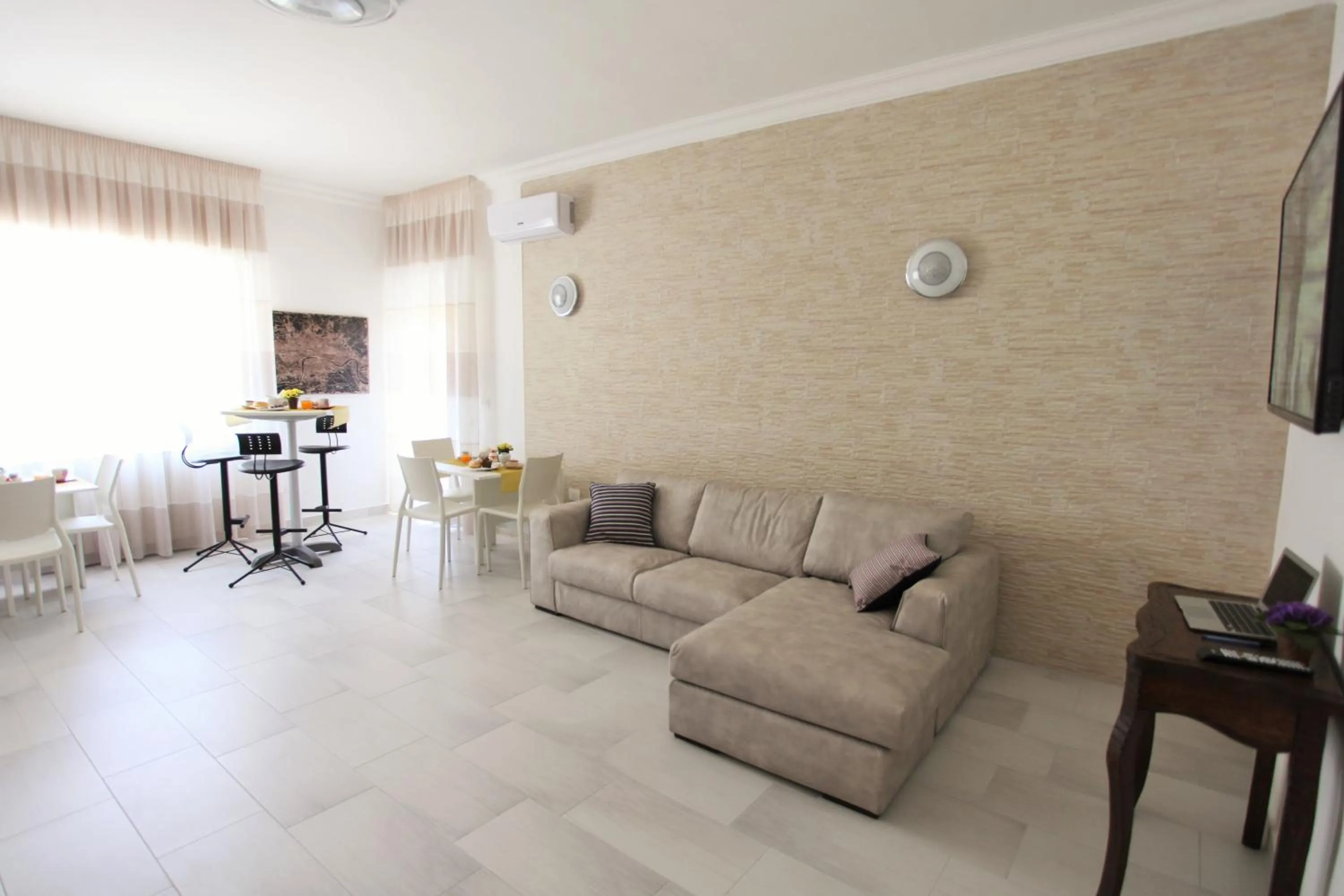 Communal lounge/ TV room in Central Apartments