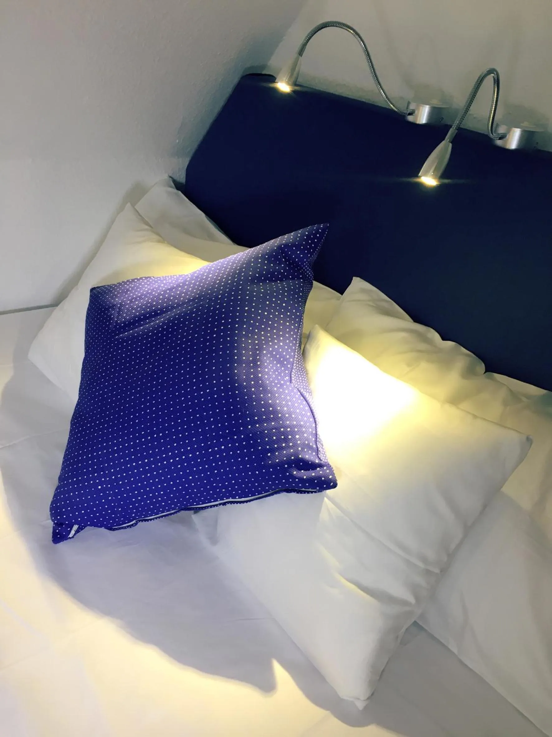 Bed in Lilis kleines Hotel