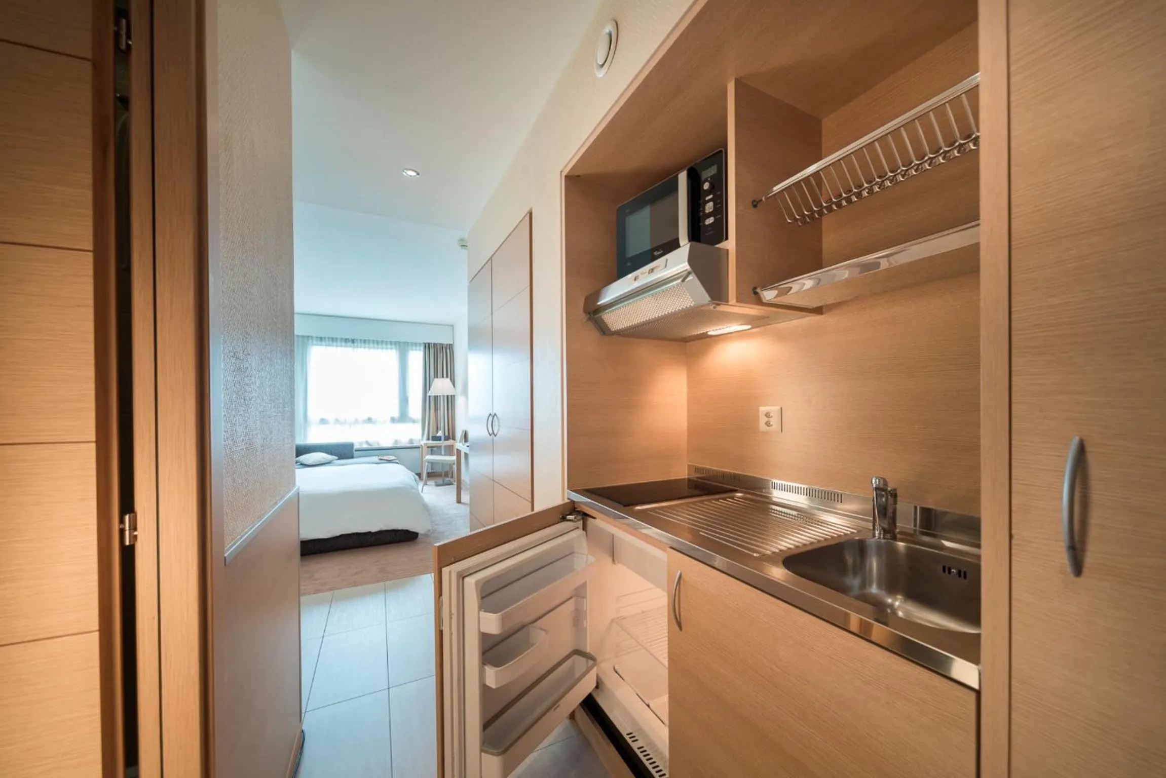 Kitchen or kitchenette in Starling Hôtel Résidence Genève