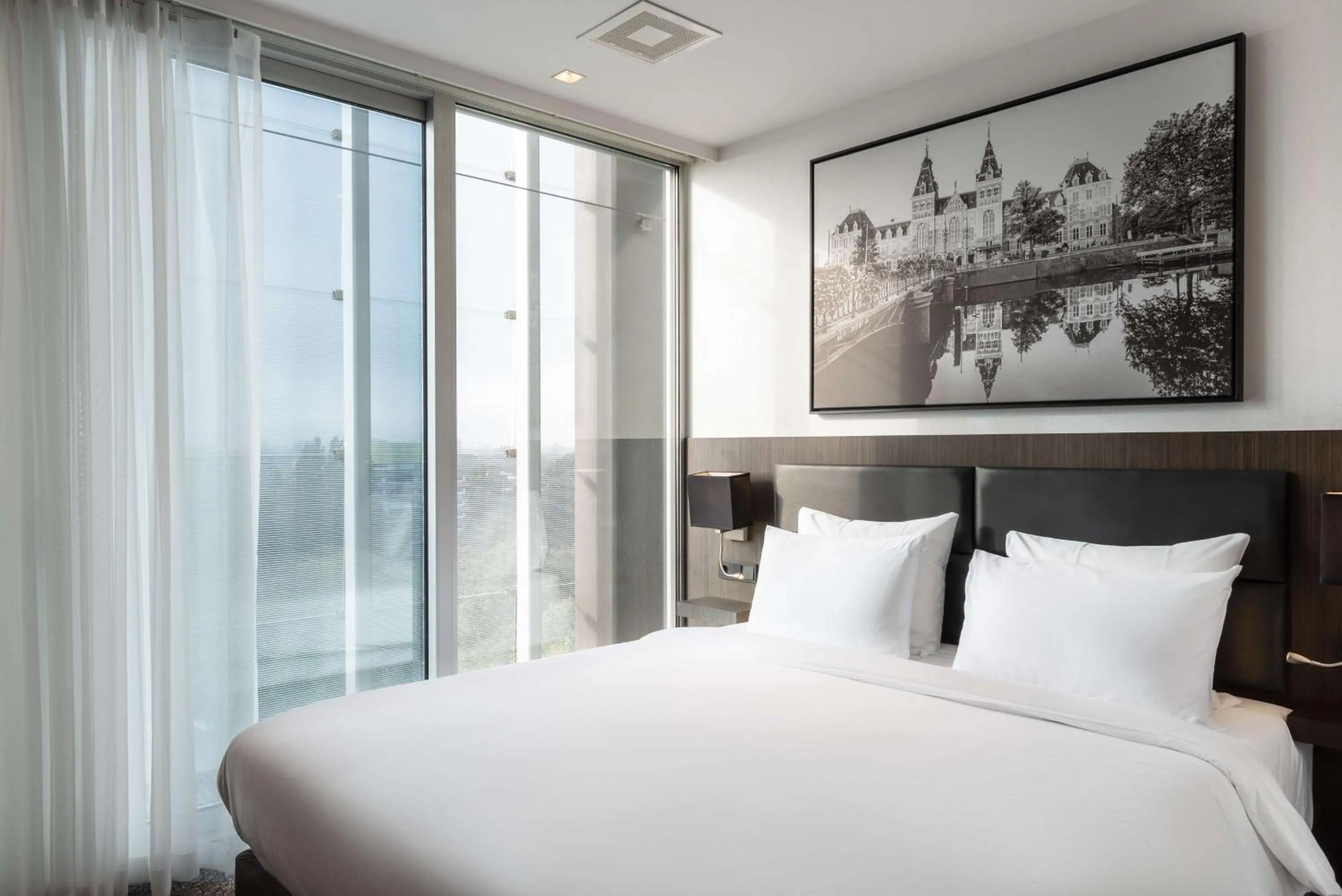 Photo of the whole room, Bed in Radisson Hotel & Suites Amsterdam South