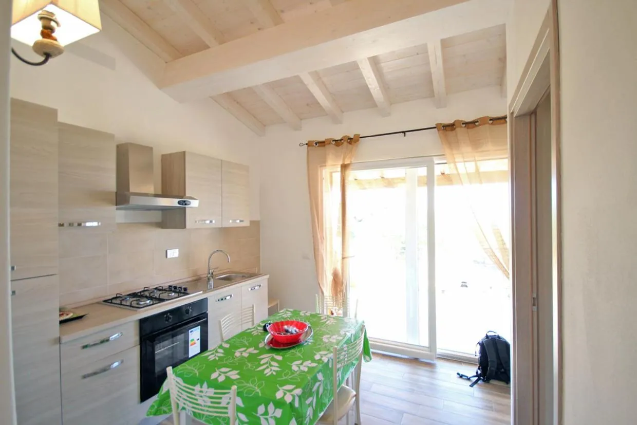 Communal lounge/ TV room in Villa Artemide