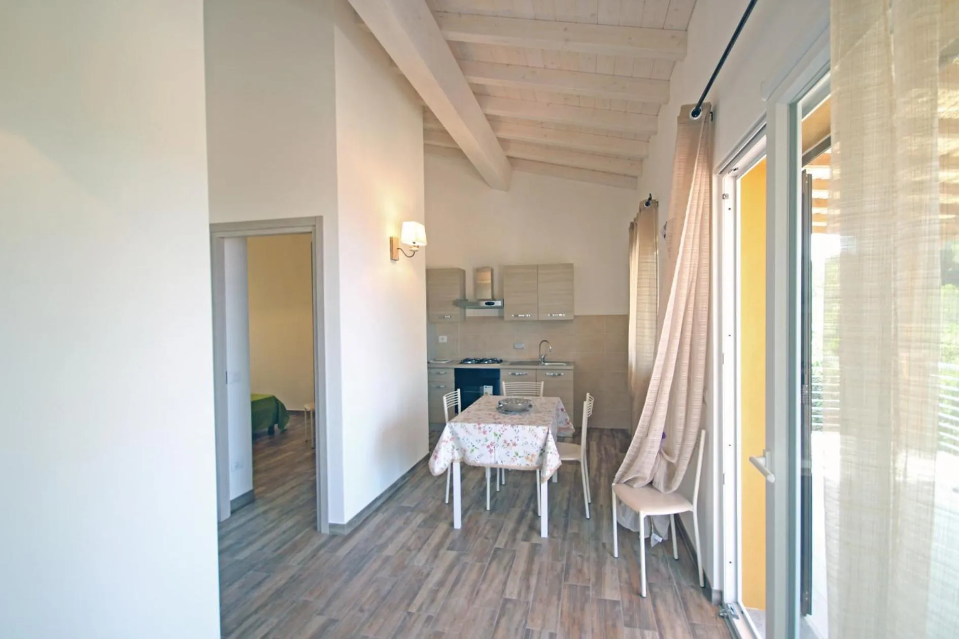 Communal lounge/ TV room in Villa Artemide