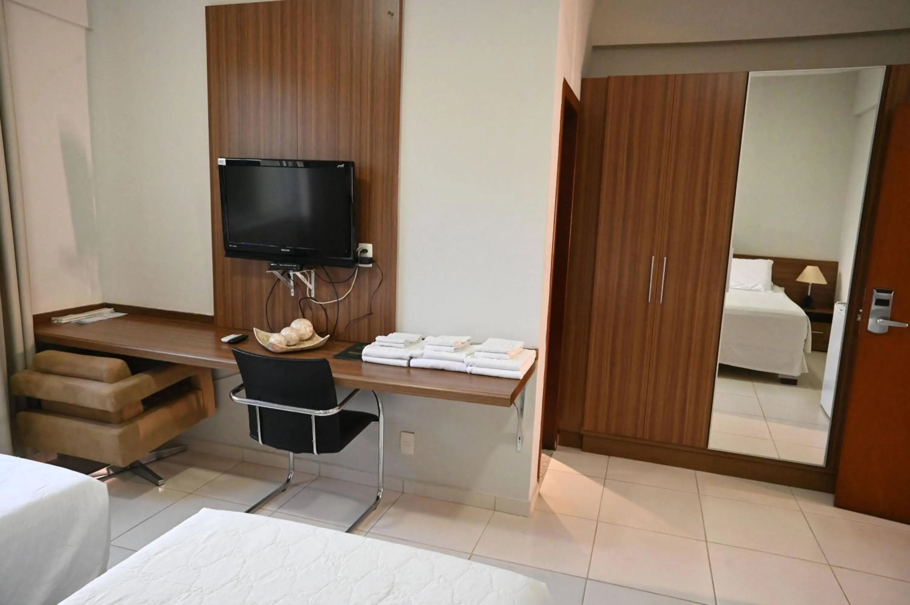 Bed in Paracatu Plaza Hotel