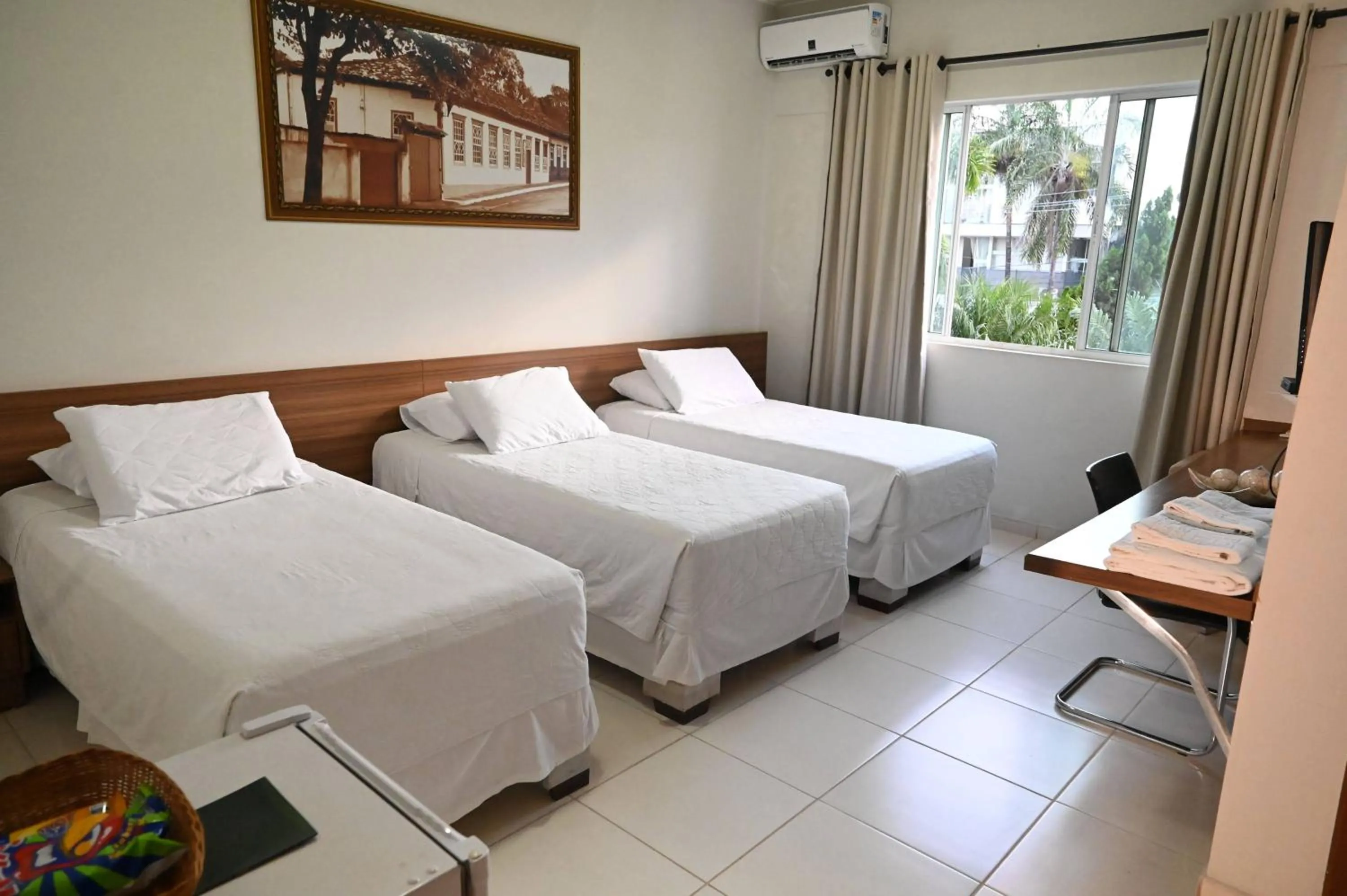 Bed in Paracatu Plaza Hotel