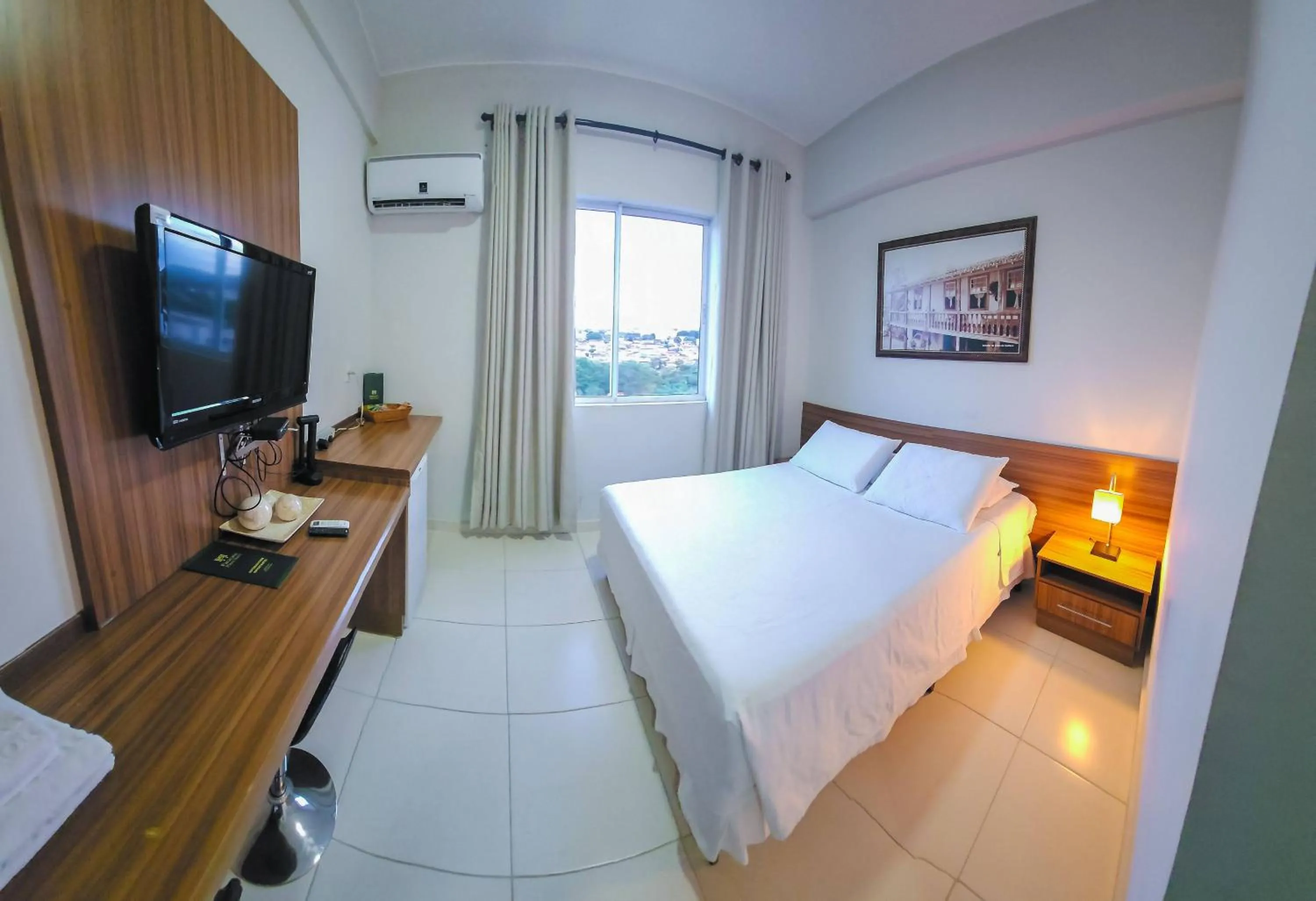 Bed in Paracatu Plaza Hotel