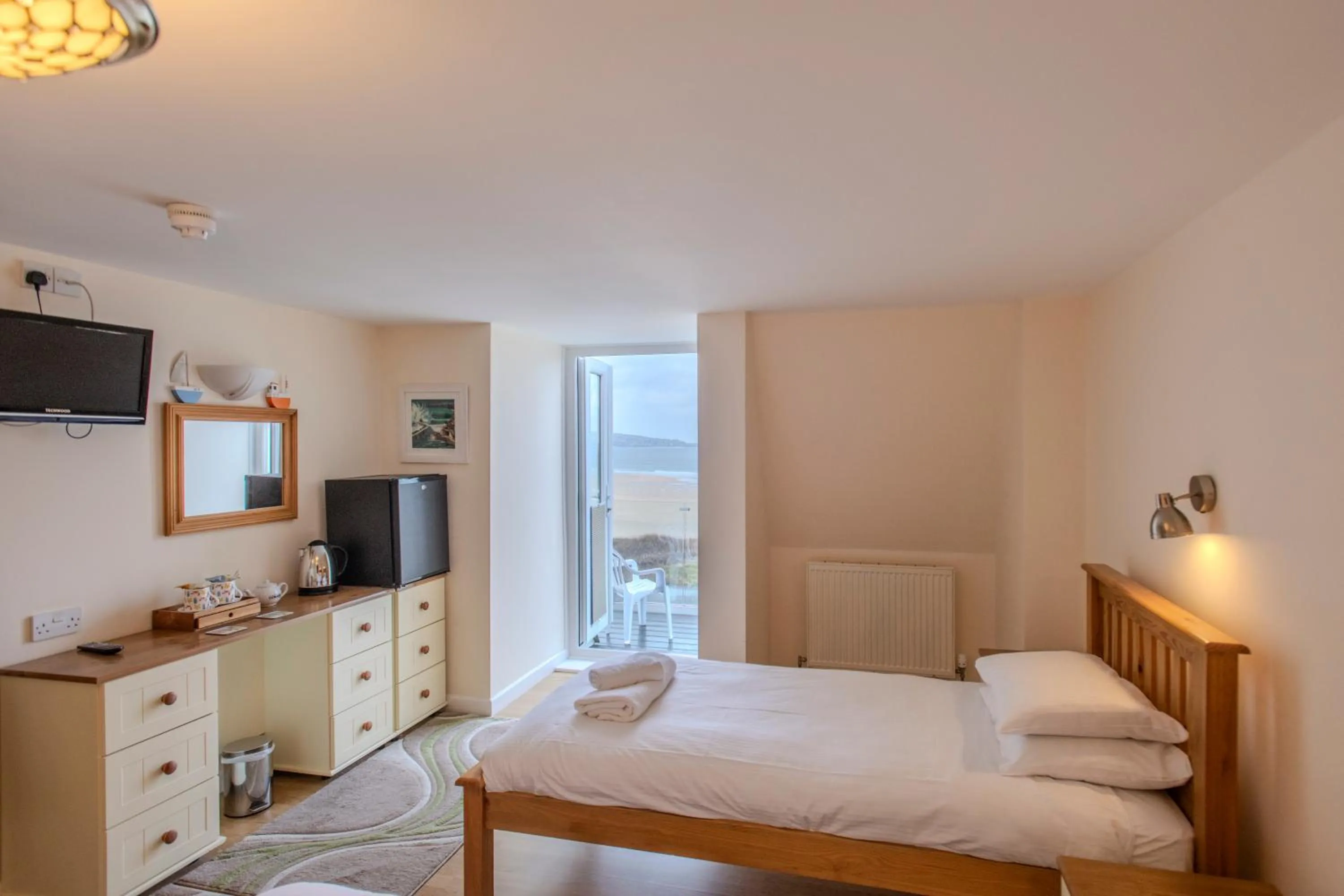 Bed in The Penellen guest accommodation room only