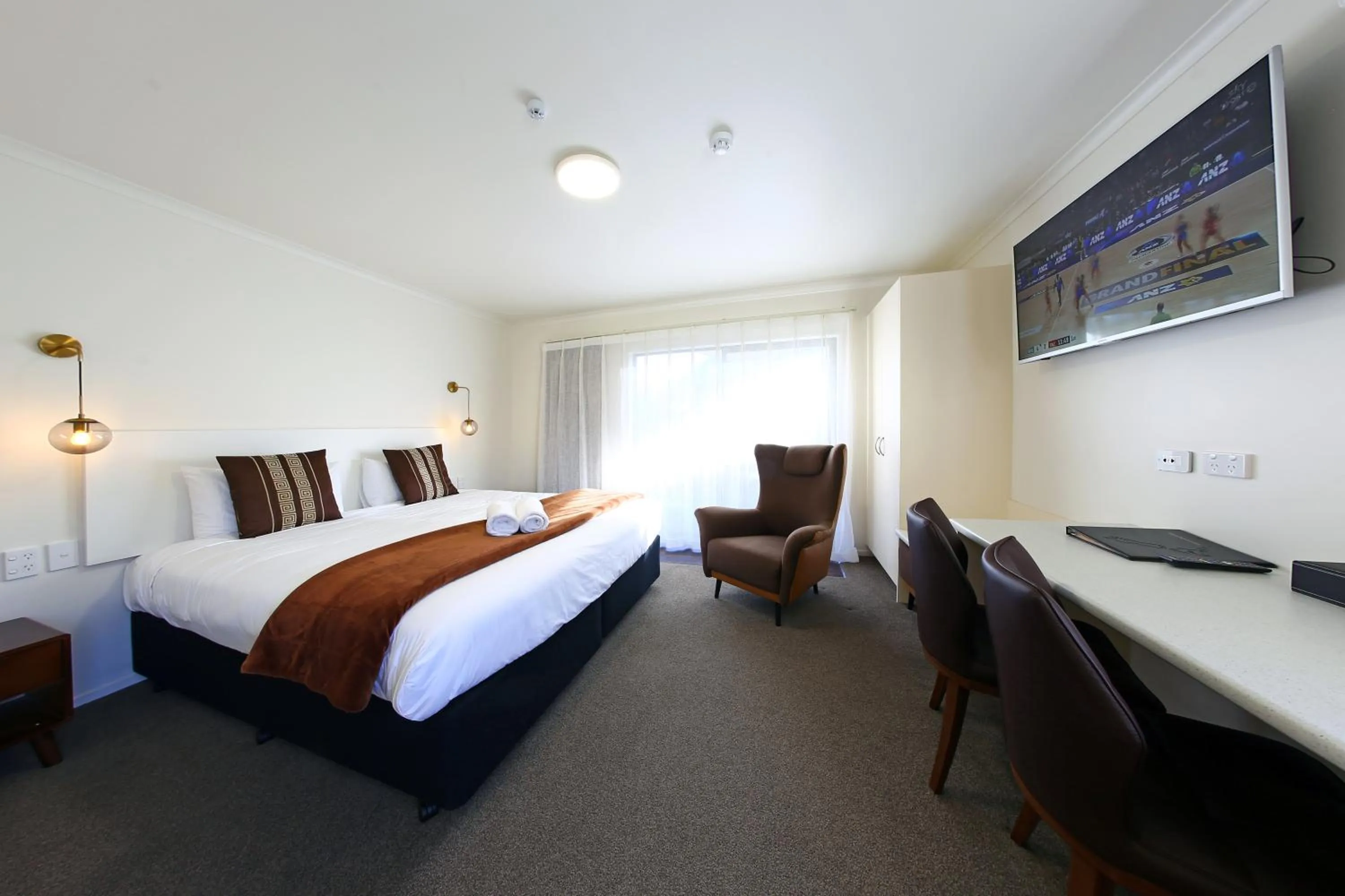 Bed in Heritage Court Lodge Oamaru