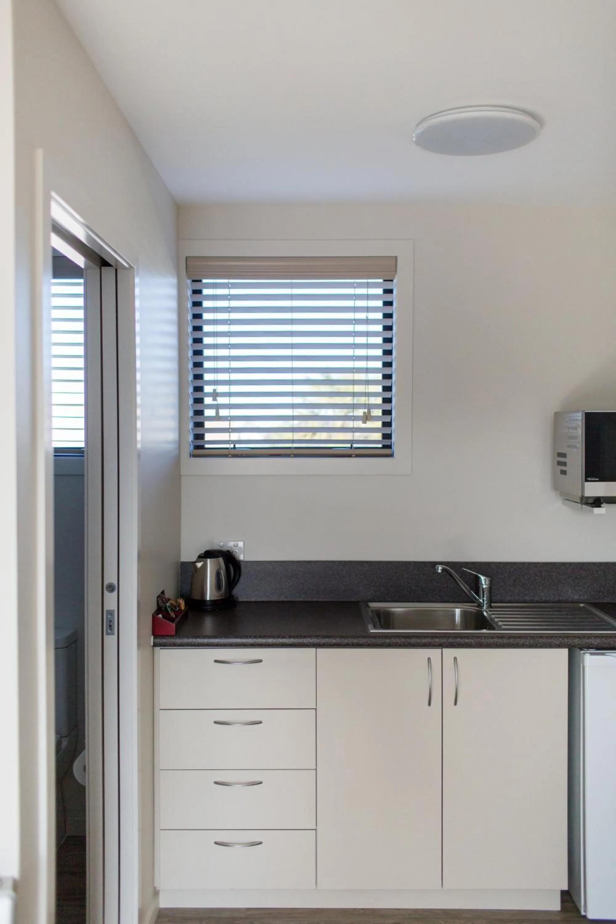 Kitchen or kitchenette in Heritage Court Lodge Oamaru