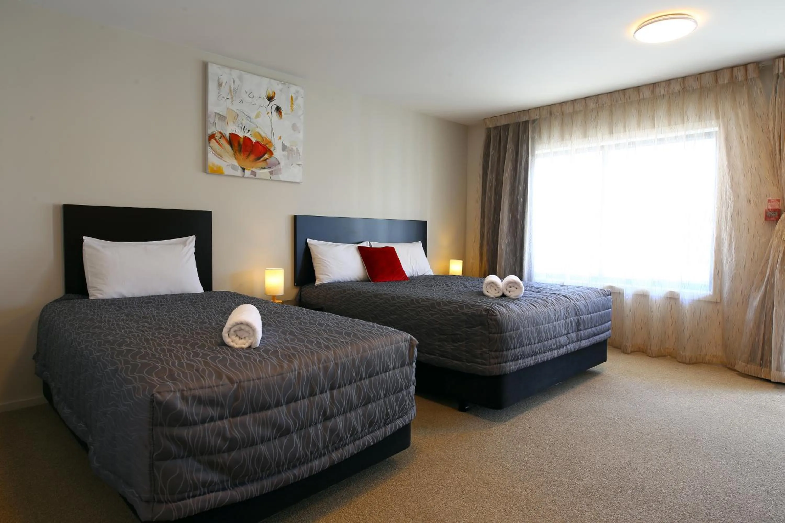 Bed in Heritage Court Lodge Oamaru