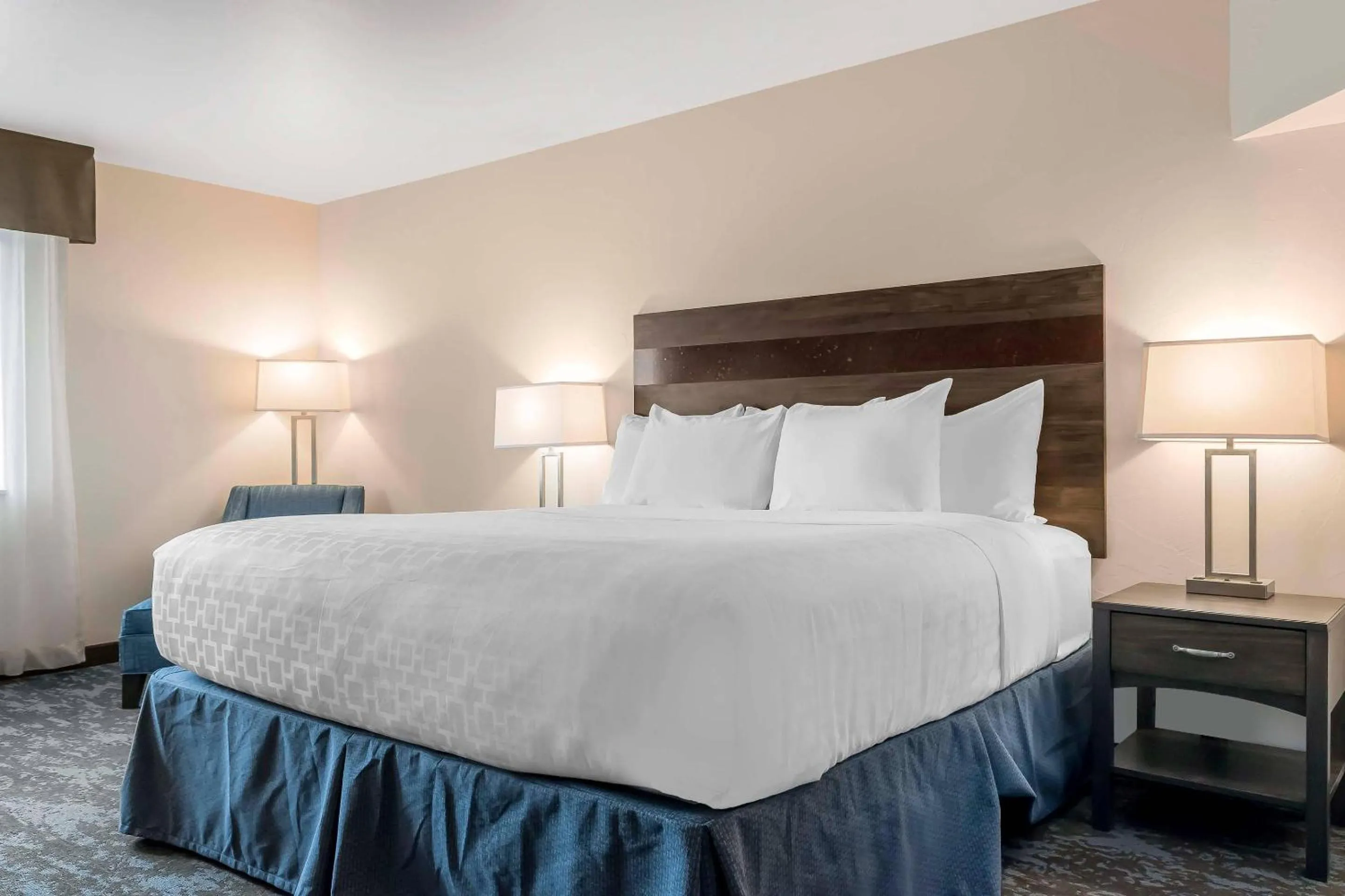 Bedroom, Bed in Copper King Convention Center, an Ascend Collection Hotel