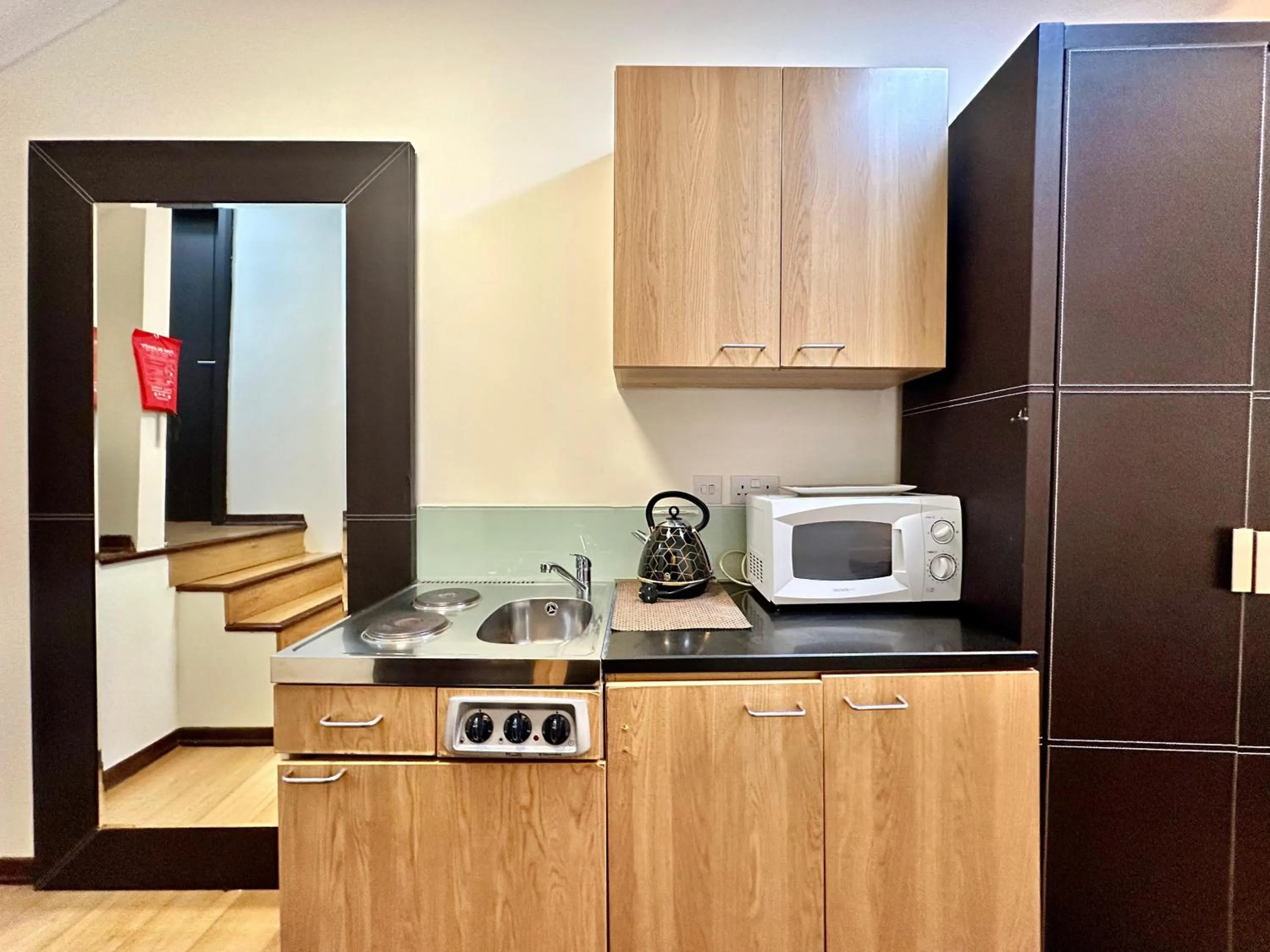 Kitchen or kitchenette in The Royale Chulan Hyde Park Hotel