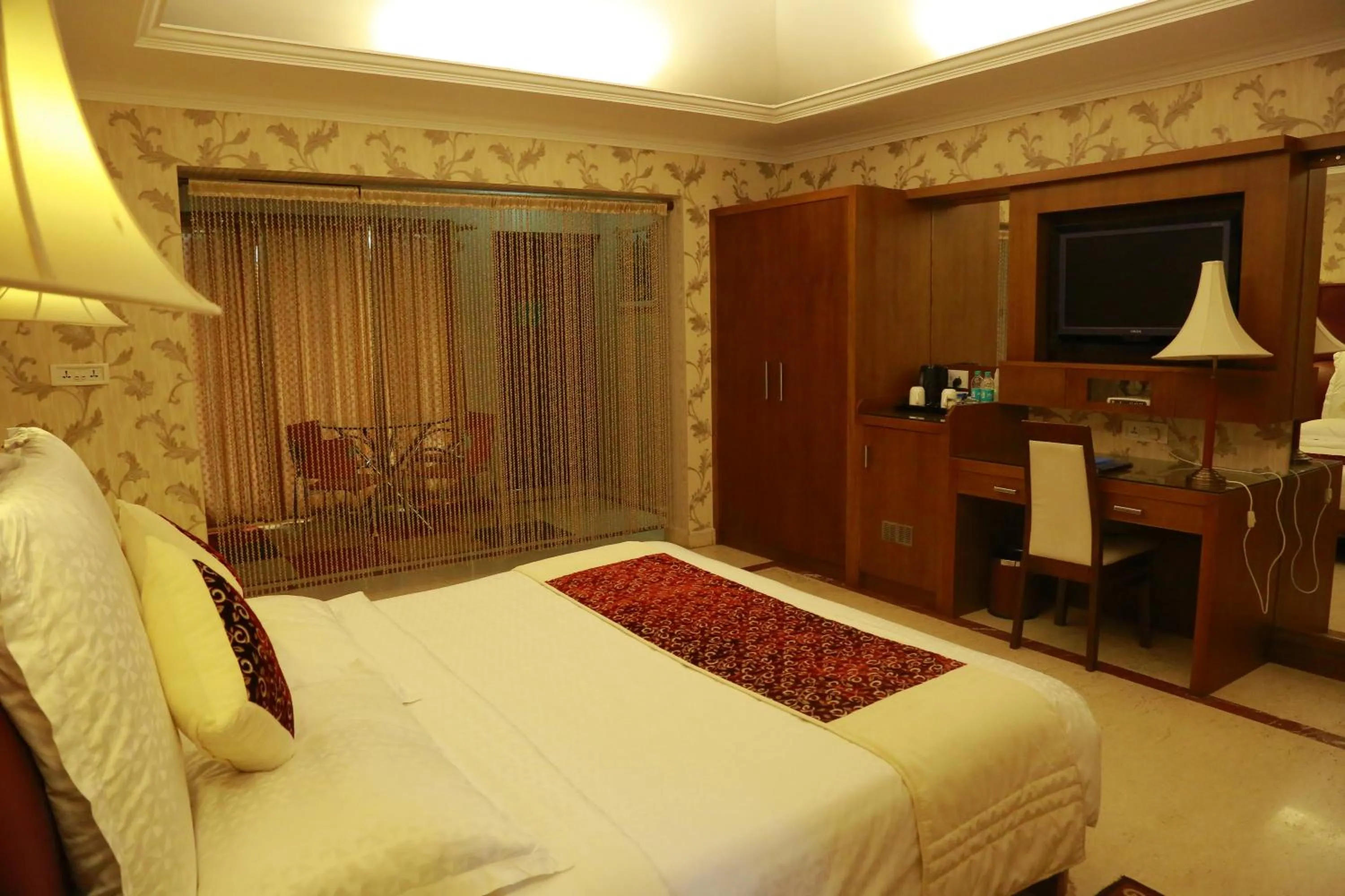 Bed in SAJ Earth Resort & Convention Center , Kochi