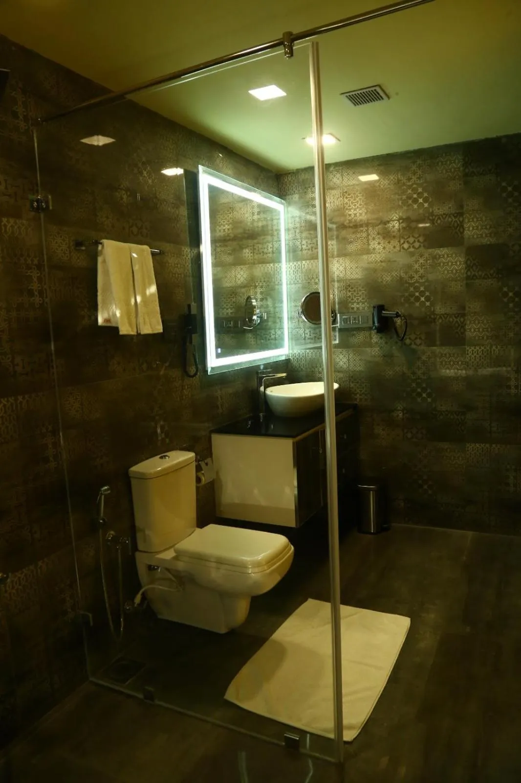 Toilet in SAJ Earth Resort & Convention Center , Kochi