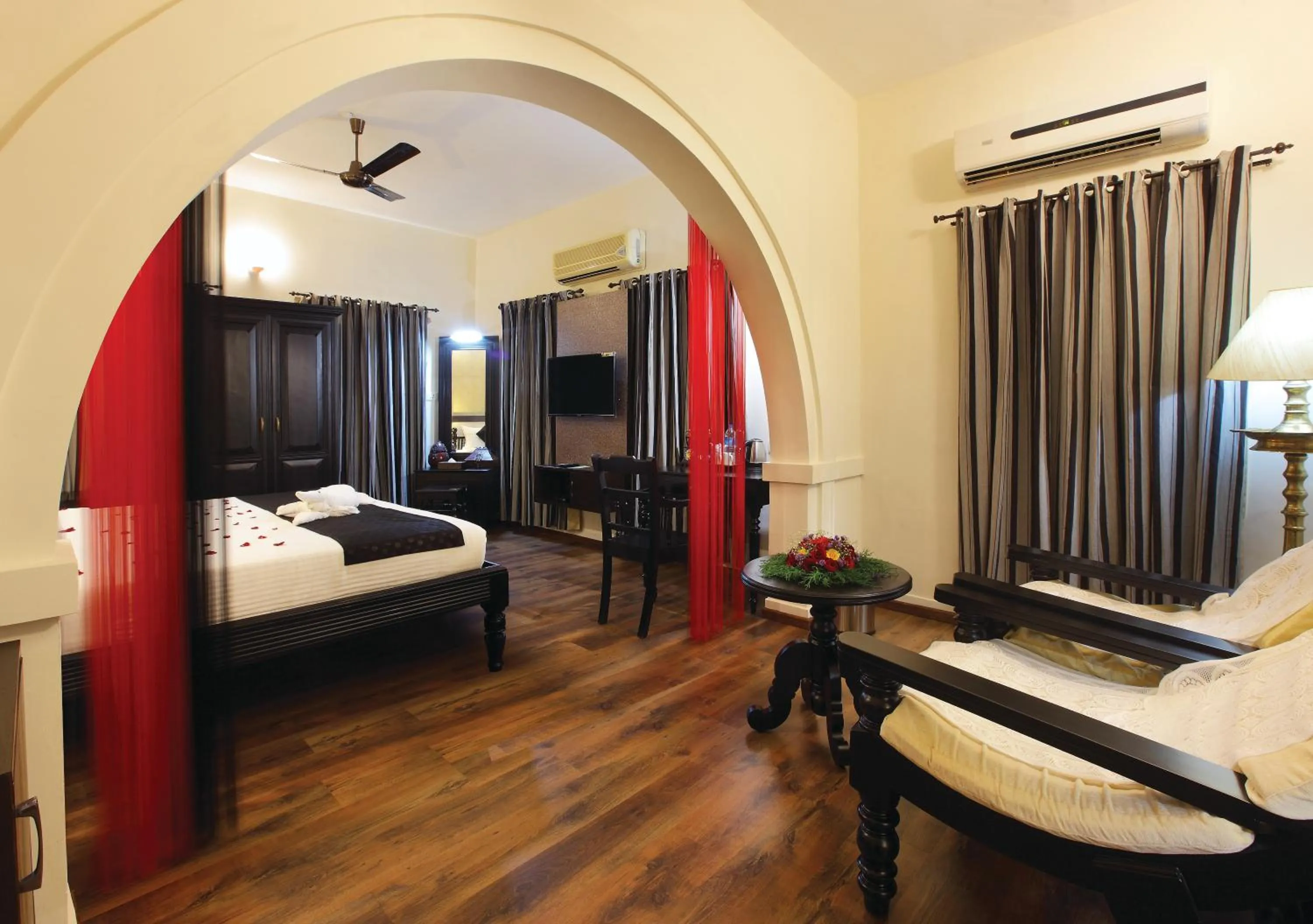 Bed in The River Retreat Heritage Ayurvedic Resort